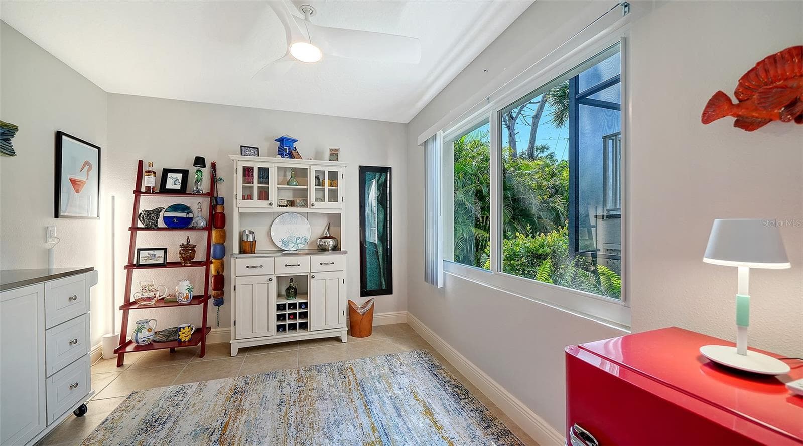Flexible office with built-in storage and natural light. - 5188 SIESTA WOODS DR, SARASOTA