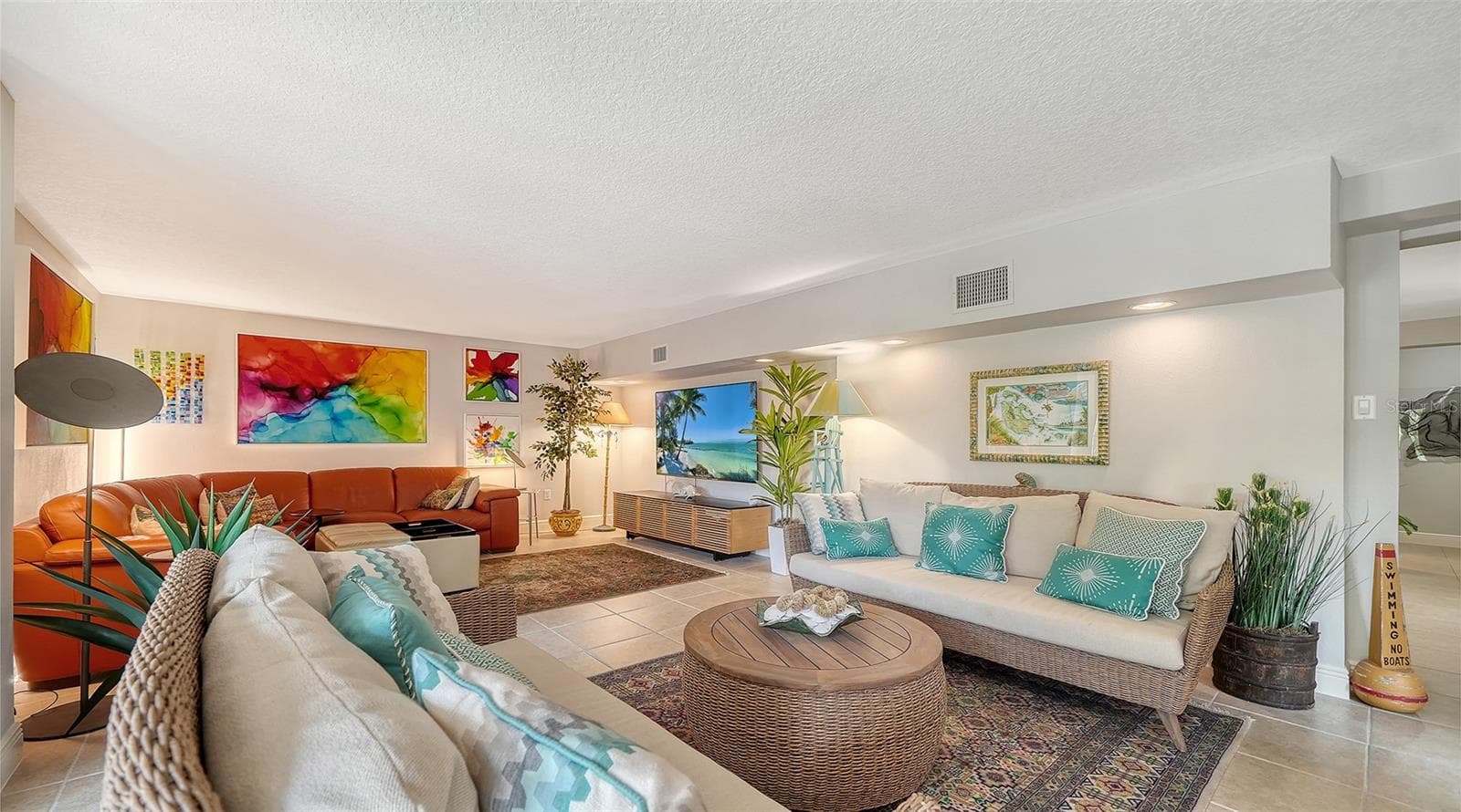 Expansive living space with easy access to the outdoor areas. - SARASOTA