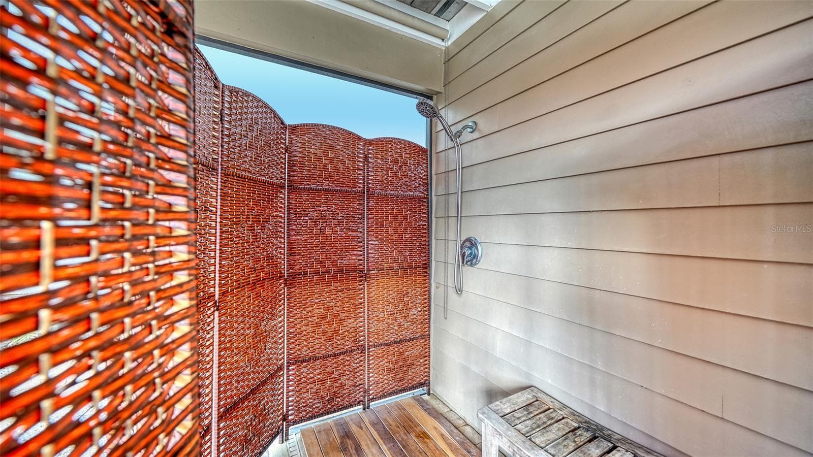 Outdoor shower adds convenience after a day at the pool or beach. - SARASOTA