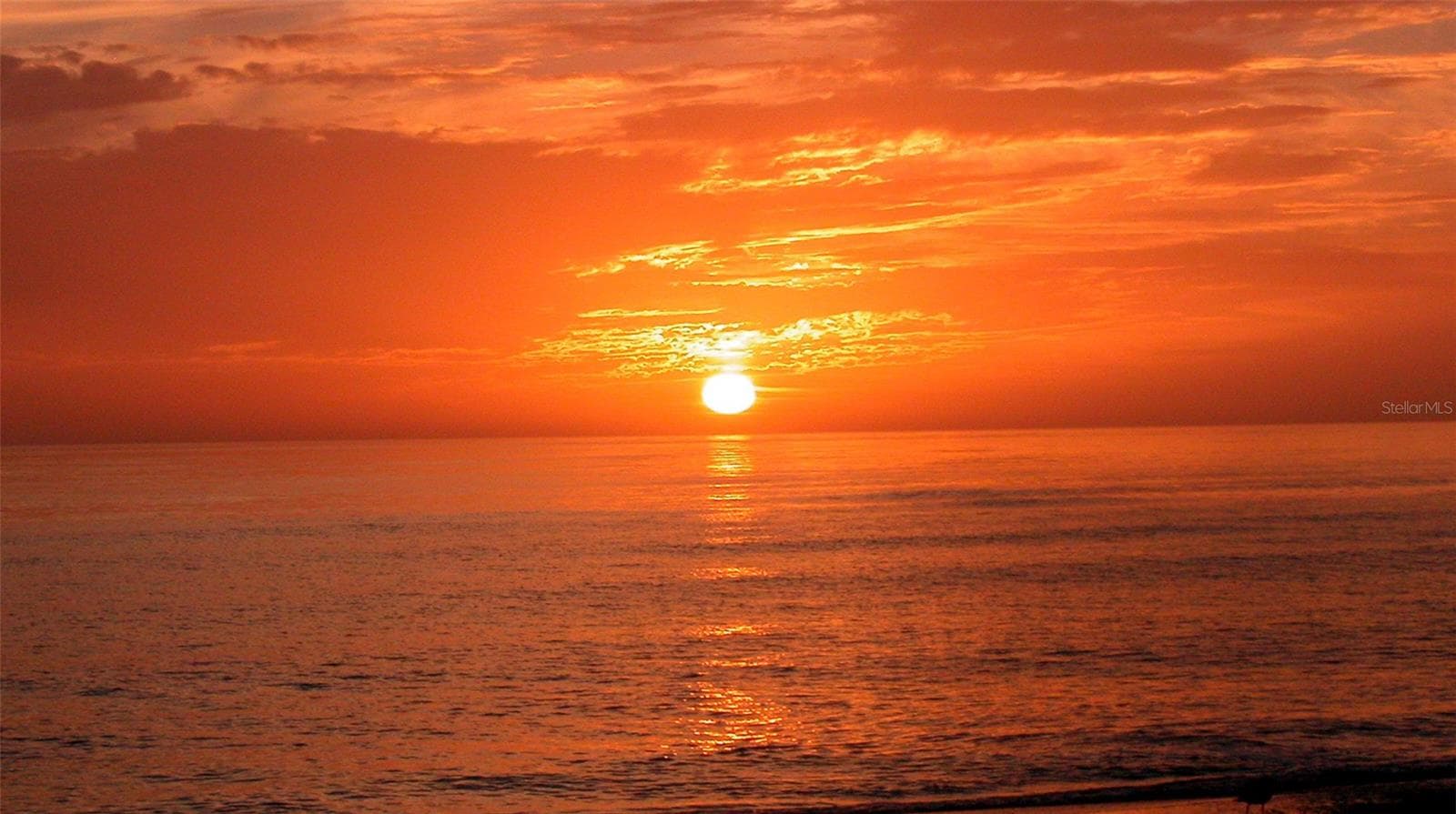 Spectacular Gulf sunsets are part of the Siesta Key lifestyle. - 5188 SIESTA WOODS DR, SARASOTA