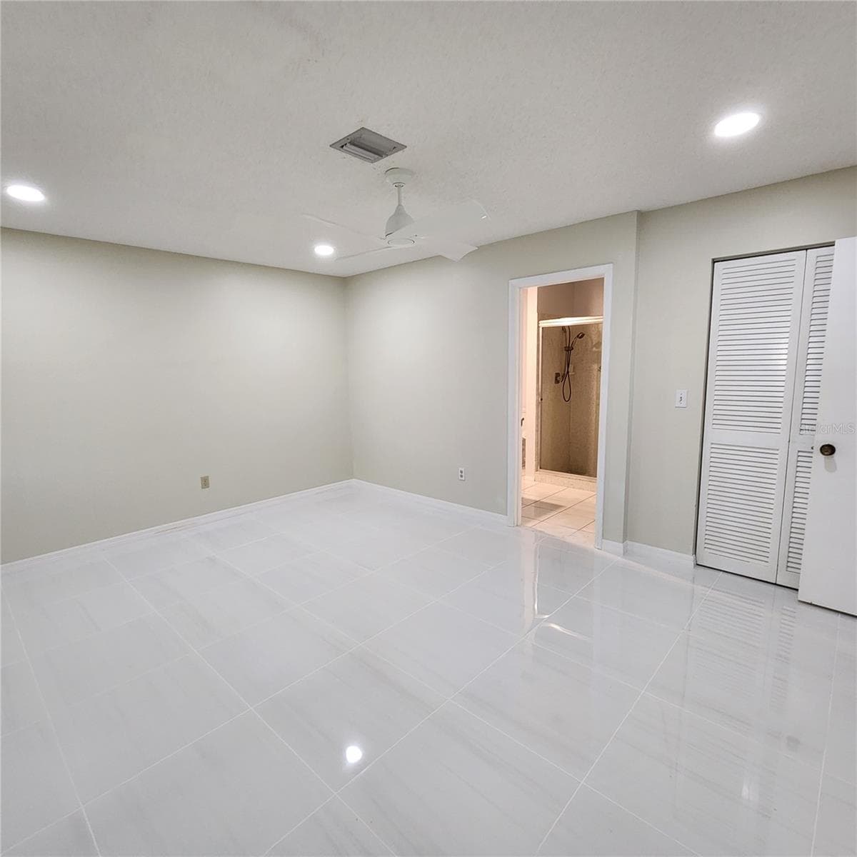 master bedroom closet and bathroom entrance - 49 SANDSTONE CIR, VENICE