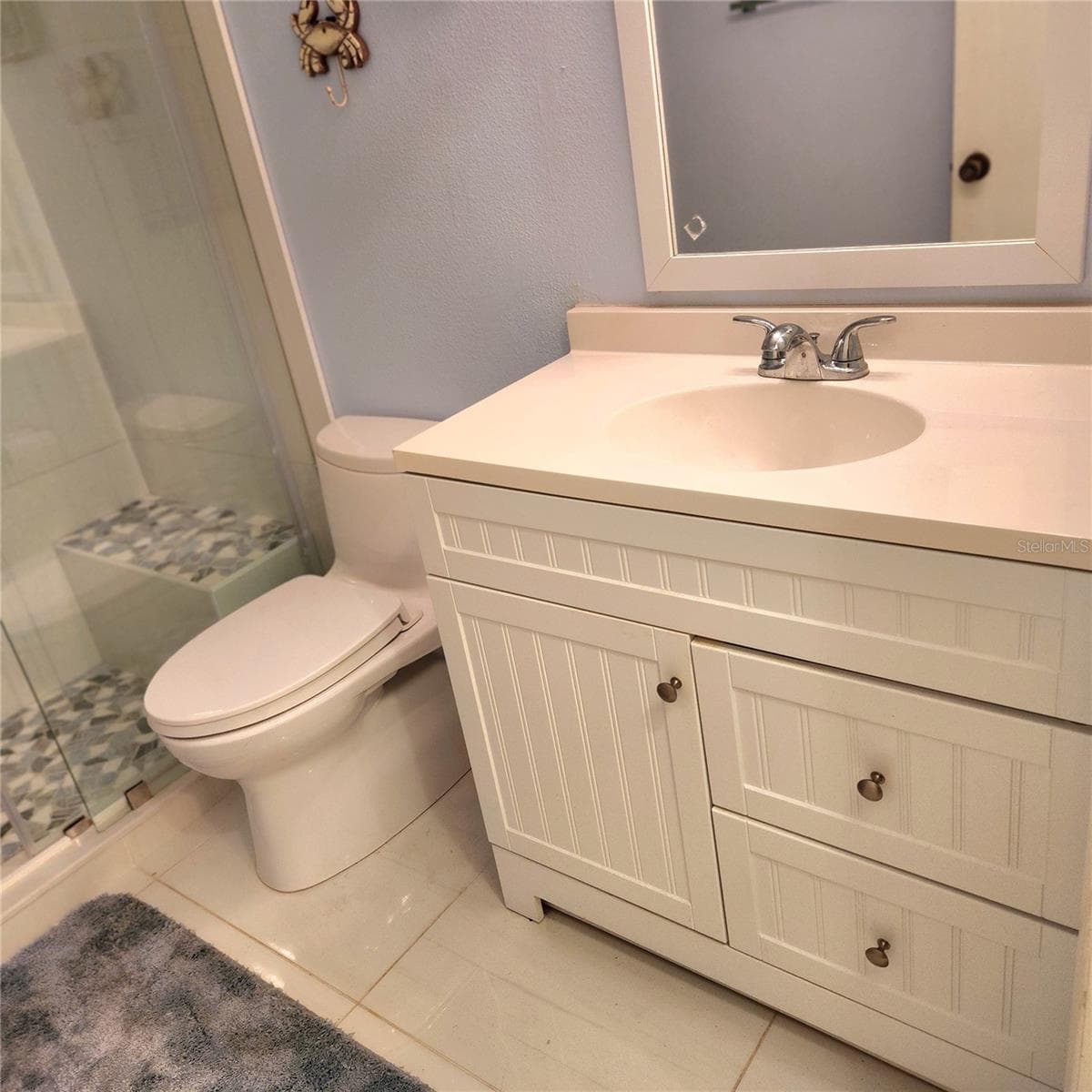 new toto toilet, vanity, flooring, shower and fixtures. ALL NEW - 49 SANDSTONE CIR, VENICE