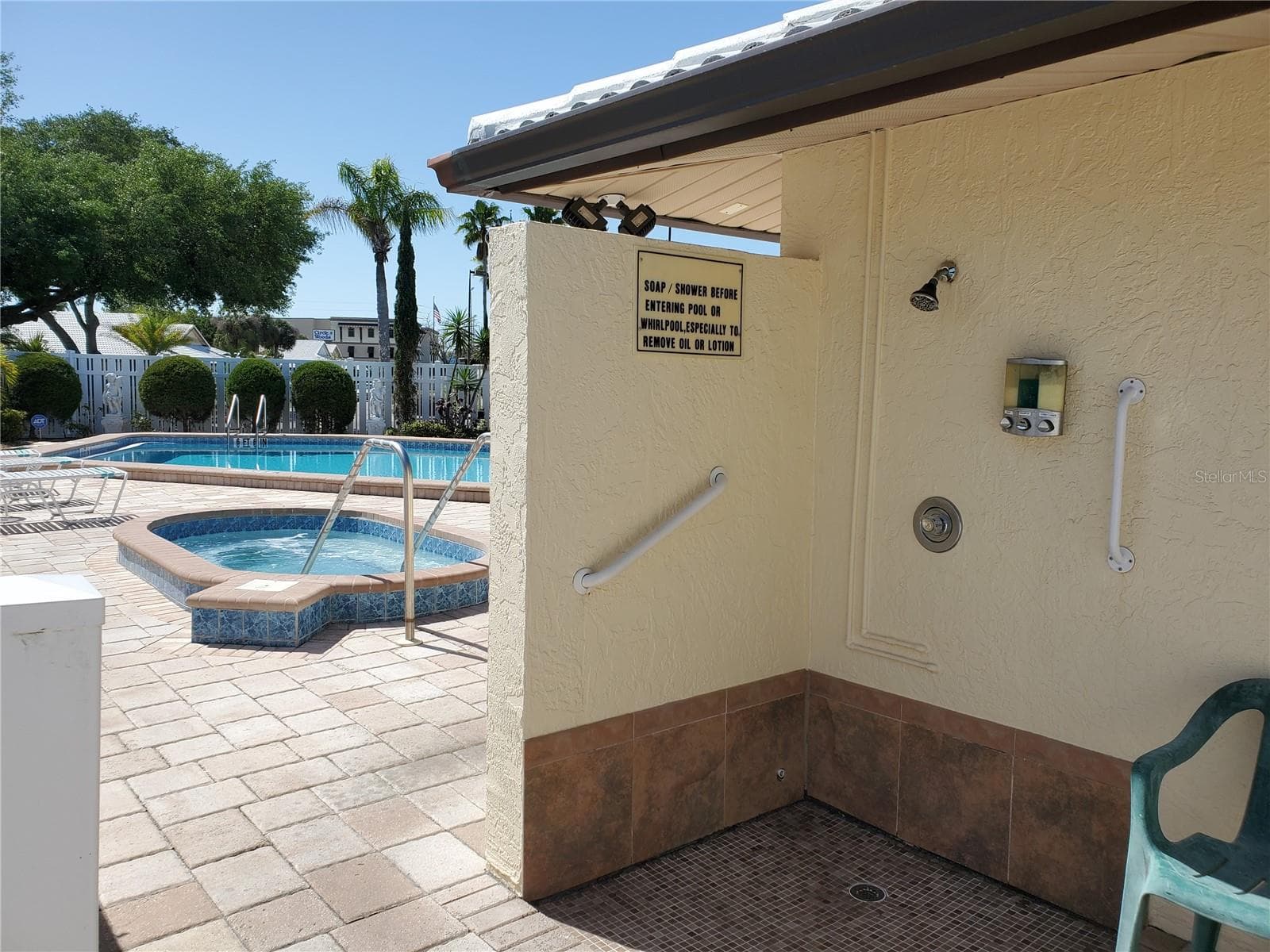 shower area at pool complete with soap, shampoo, conditioner - 49 SANDSTONE CIR, VENICE