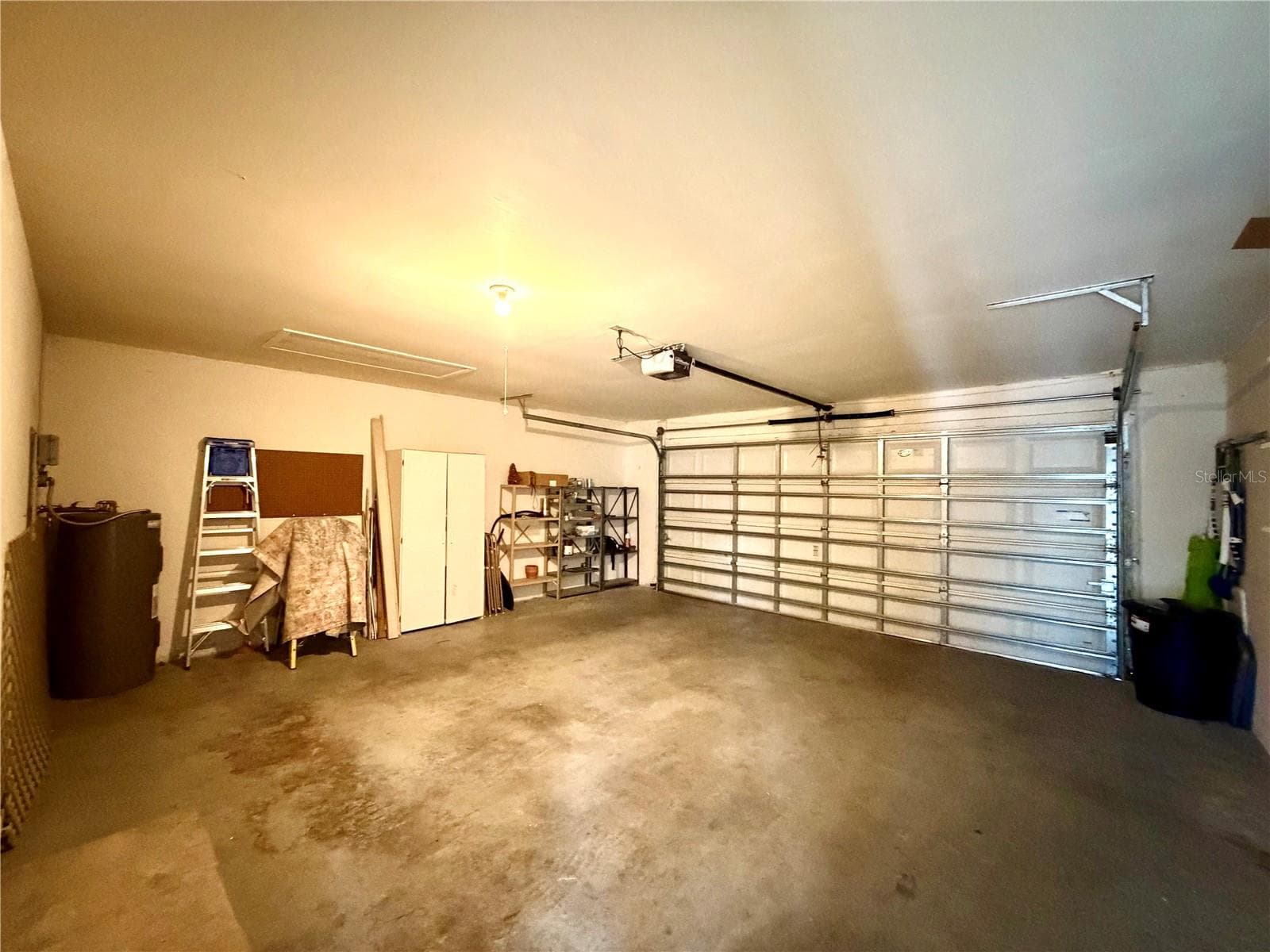Over-sized garage and storage cabinets will remain with property - 3606 57TH AVENUE DR W, BRADENTON