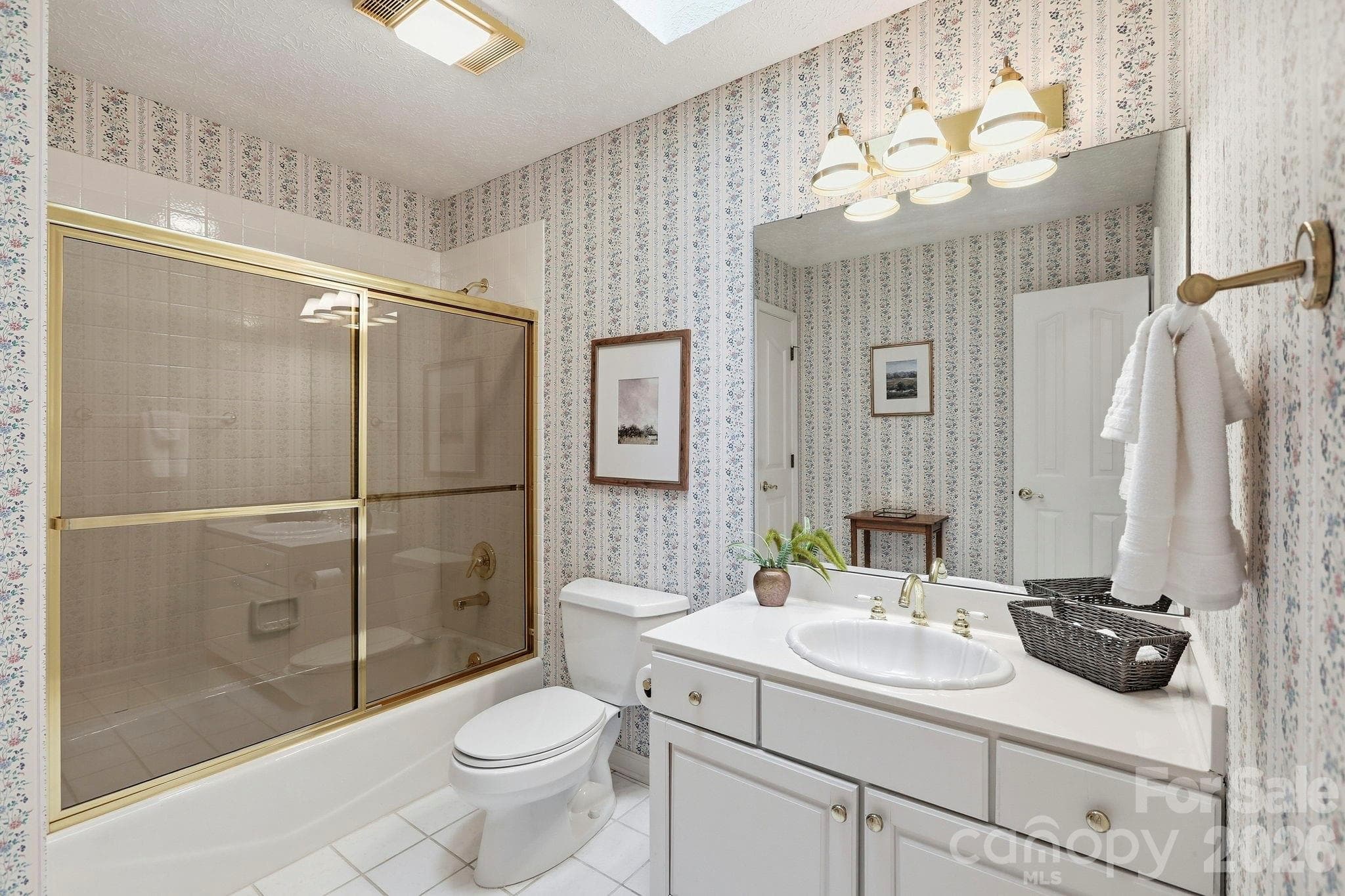 Third full bathroom on the main level, new skylights - 244 Mountain Valley Drive, Hendersonville