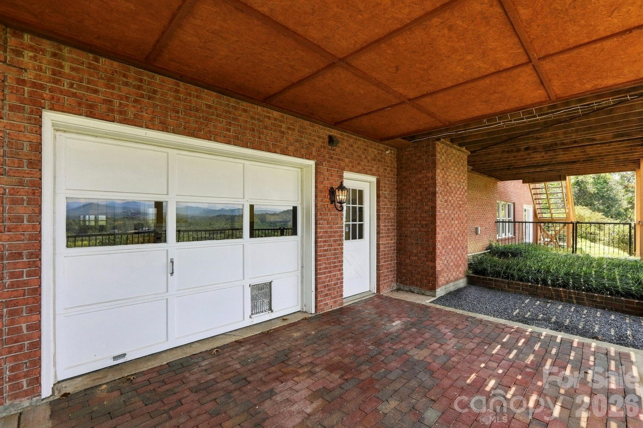 Third garage bay, easy gravel driveway access - 244 Mountain Valley Drive, Hendersonville