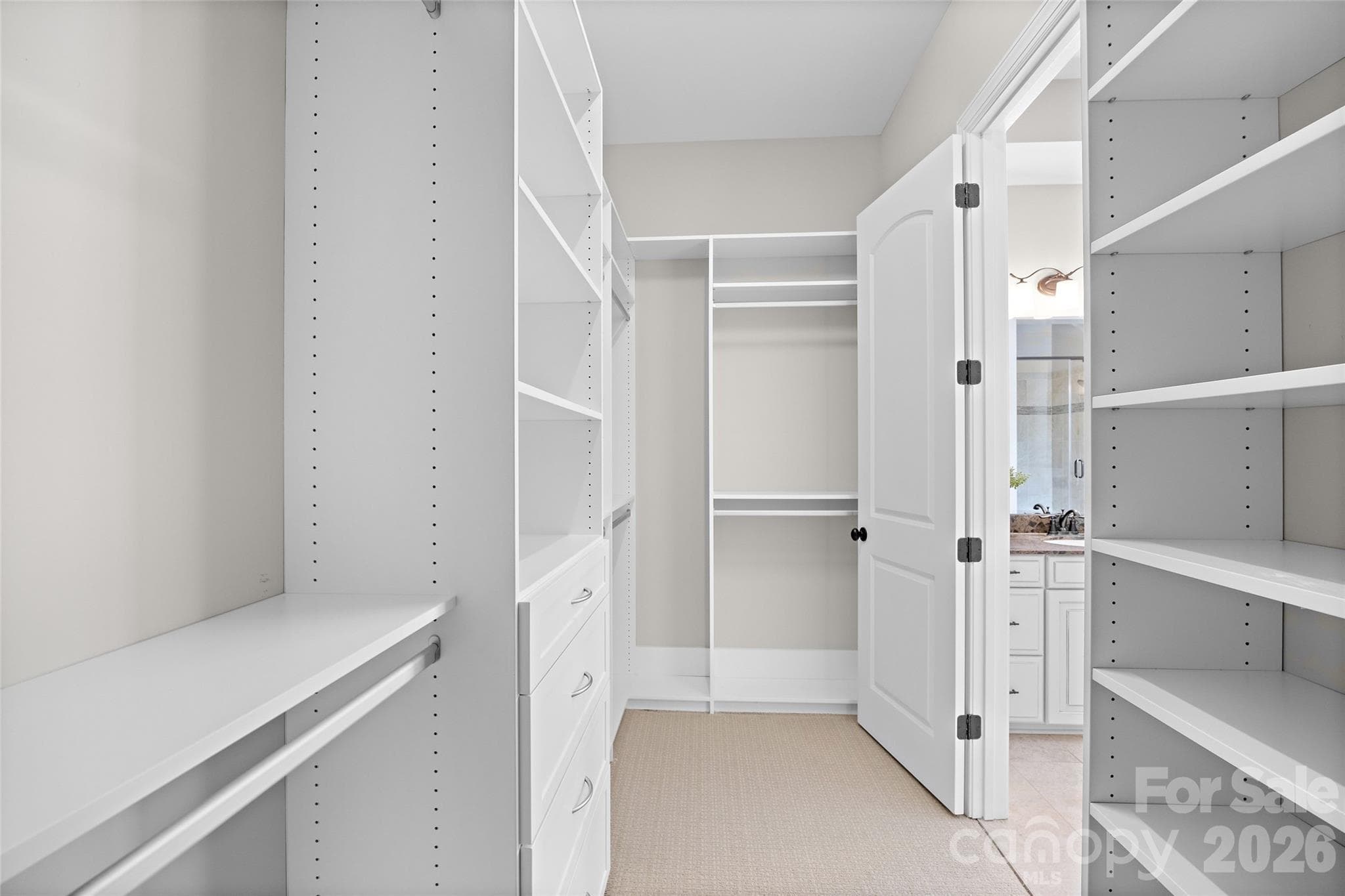 One of the large walk-in primary closets - 1623 Hawkstone Drive, Waxhaw