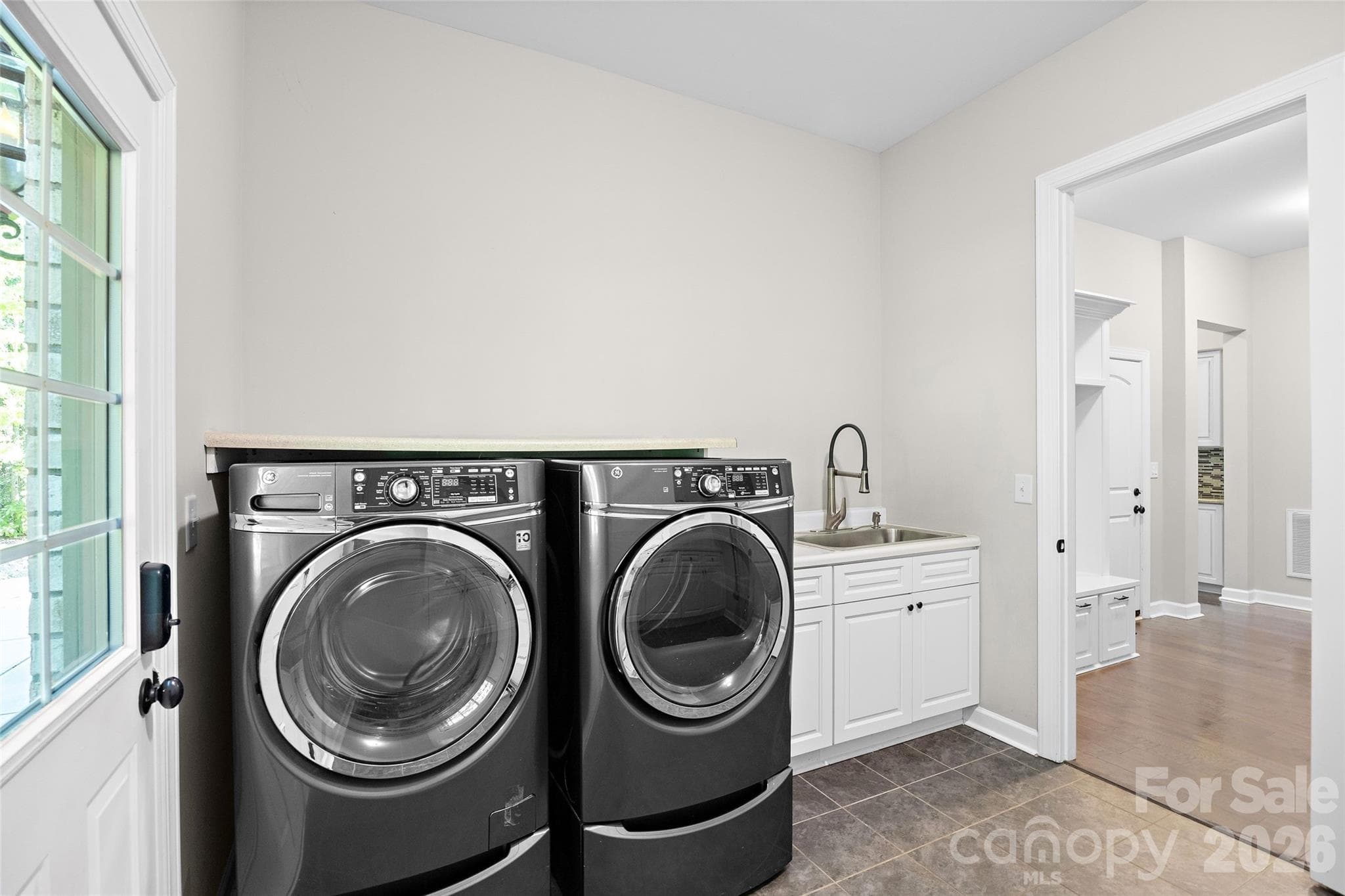 Laundry room on the main level - 1623 Hawkstone Drive, Waxhaw