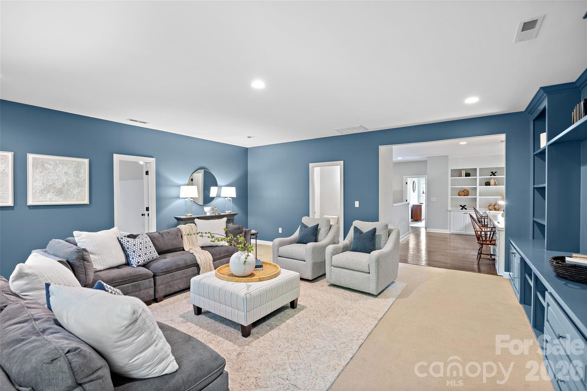 Spacious bonus upstairs features lovely built-ins, another half bath, and a separate flex space that would make for a great workout room! - 1623 Hawkstone Drive, Waxhaw