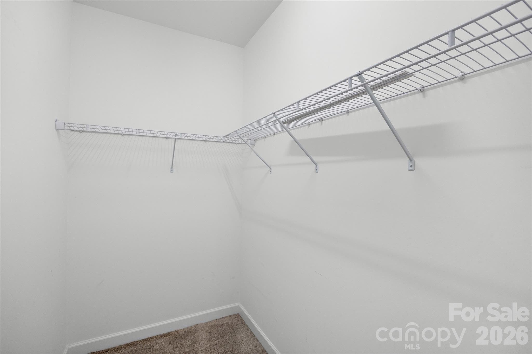 Large walk-in closet connected to 4th bedroom upstairs - 1623 Hawkstone Drive, Waxhaw