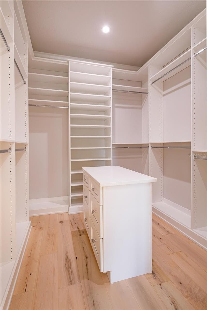 Primary closet - 533 COUNTRY CLUB DR, WINTER PARK