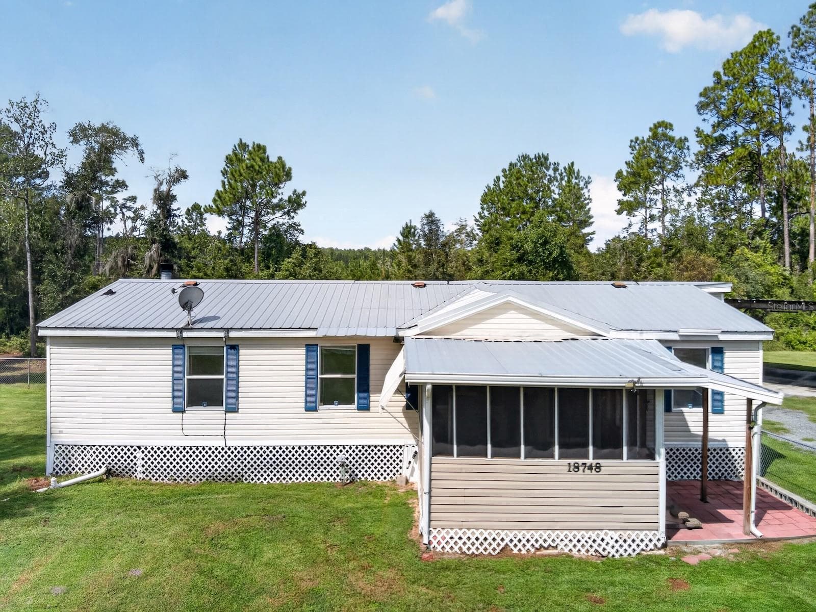 Manufactured Home at 18748 NE 148TH TERRACE RD, FORT MC COY, photo 3 of 53