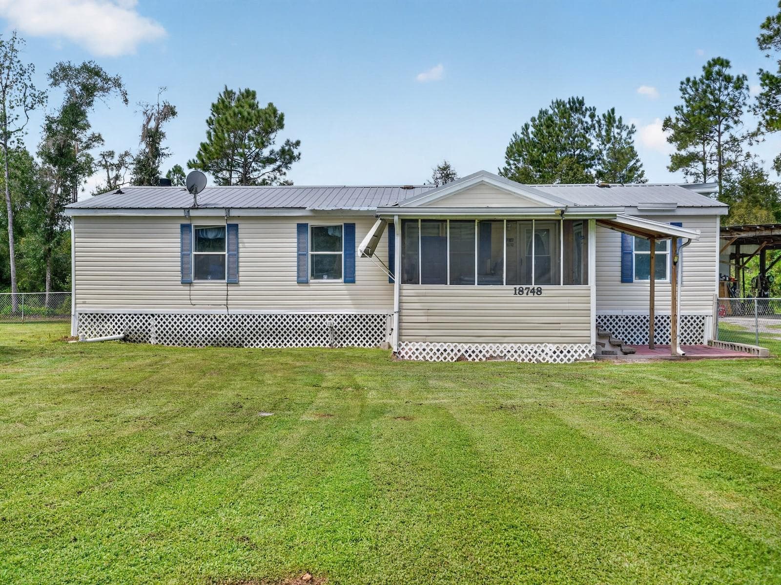 Manufactured Home at 18748 NE 148TH TERRACE RD, FORT MC COY, photo 36 of 53