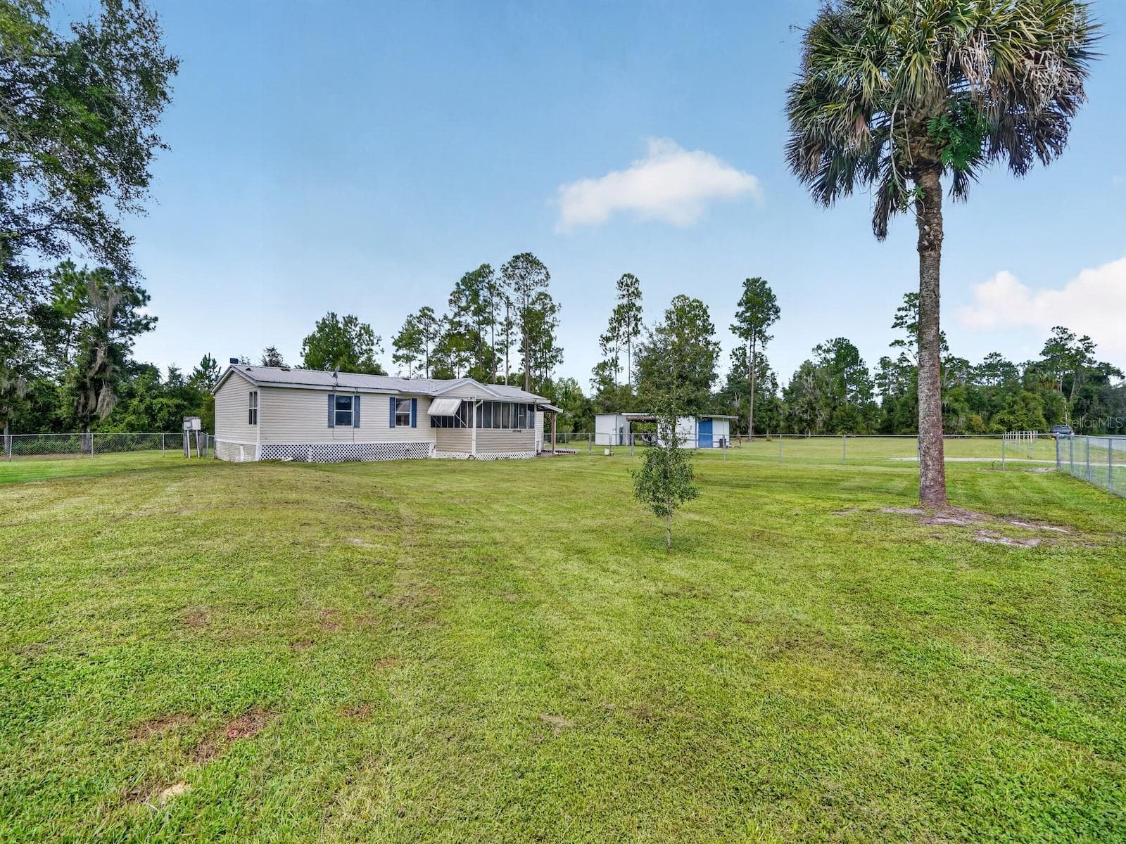 Manufactured Home at 18748 NE 148TH TERRACE RD, FORT MC COY, photo 38 of 53