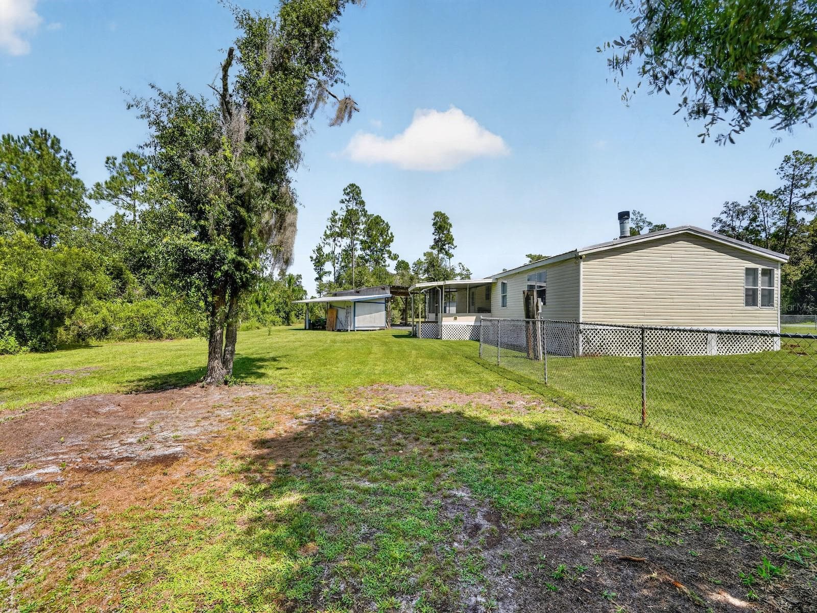 Manufactured Home at 18748 NE 148TH TERRACE RD, FORT MC COY, photo 39 of 53