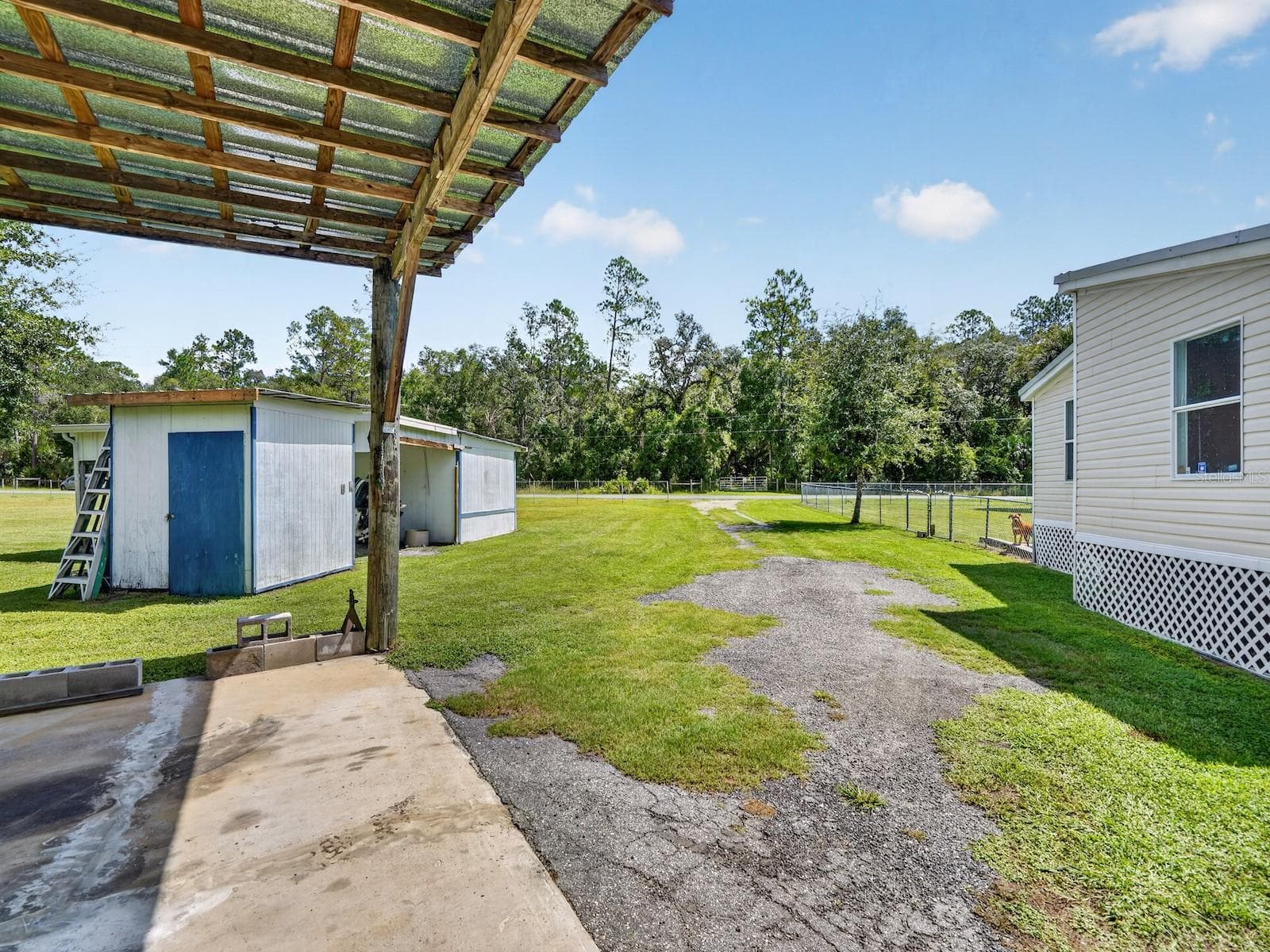 Manufactured Home at 18748 NE 148TH TERRACE RD, FORT MC COY, photo 41 of 53