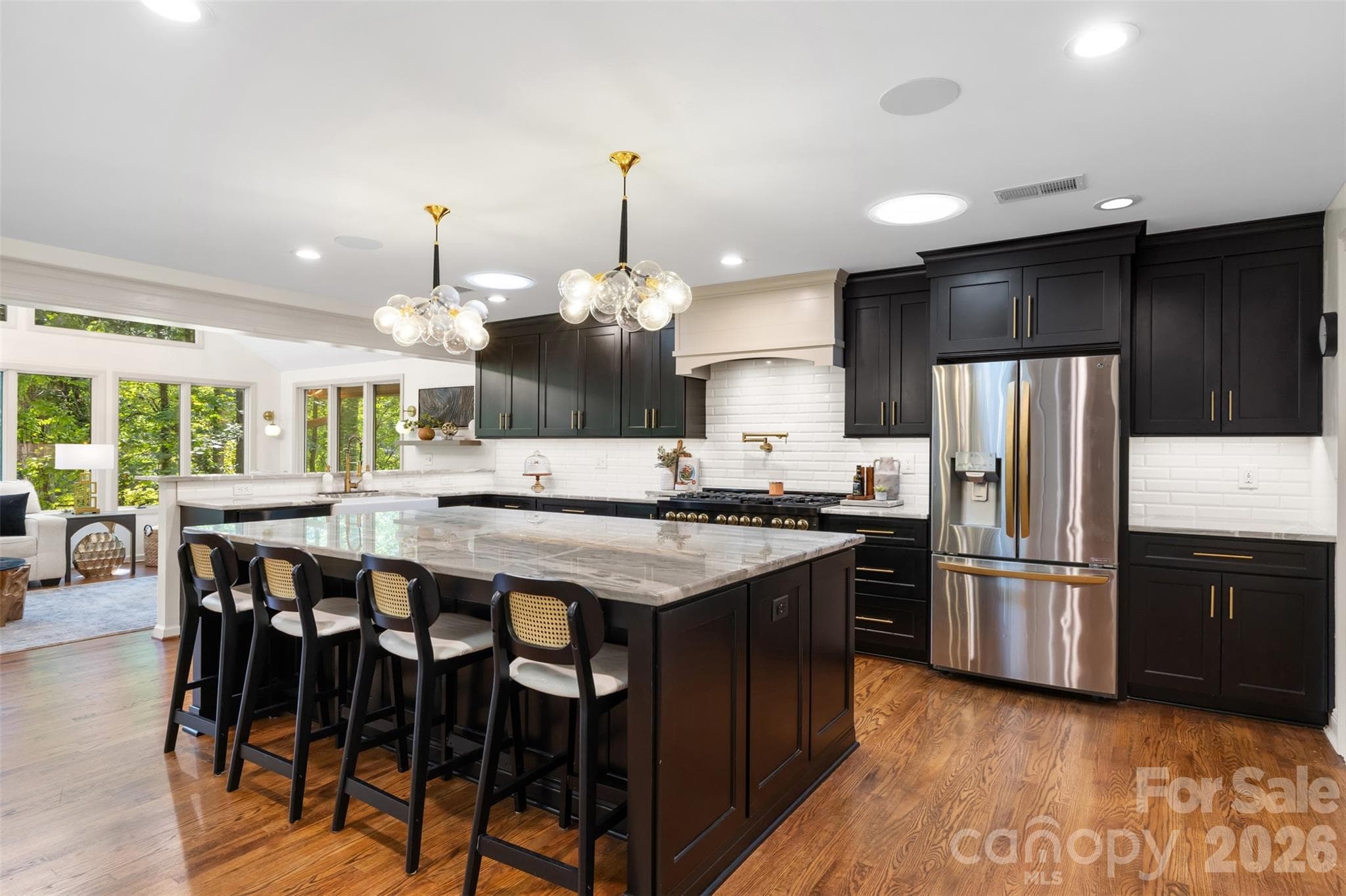 Gorgeous kitchen with quartz & stainless steel appliances. - 27 Timberidge Drive, Lake Wylie
