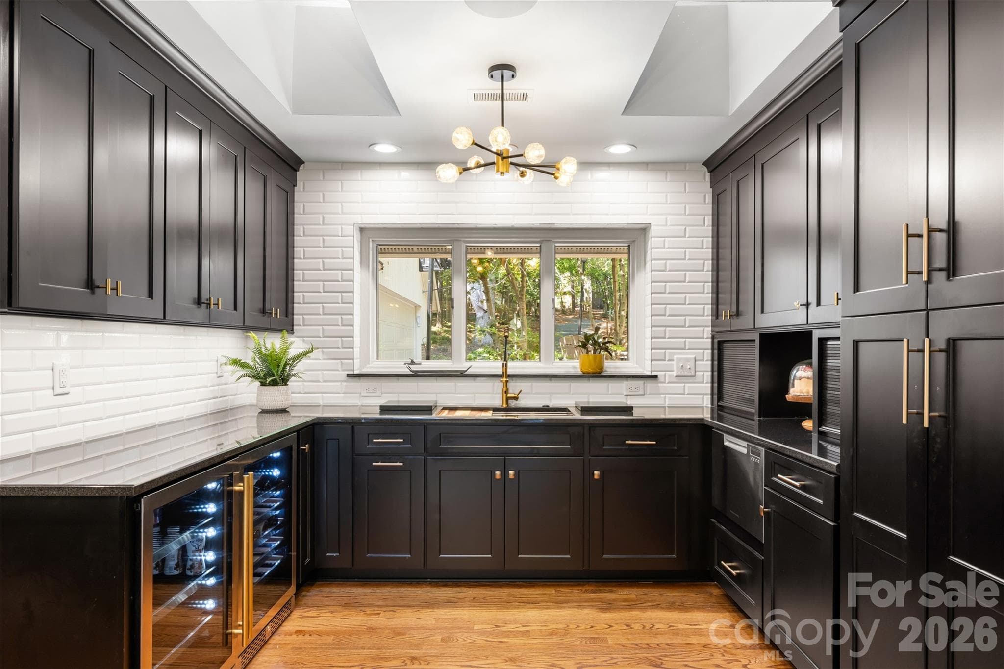 Scullery with dishwasher drawer, pull out cabinetry, dual beverage refrigerators, second sink & appliance garage's. - 27 Timberidge Drive, Lake Wylie