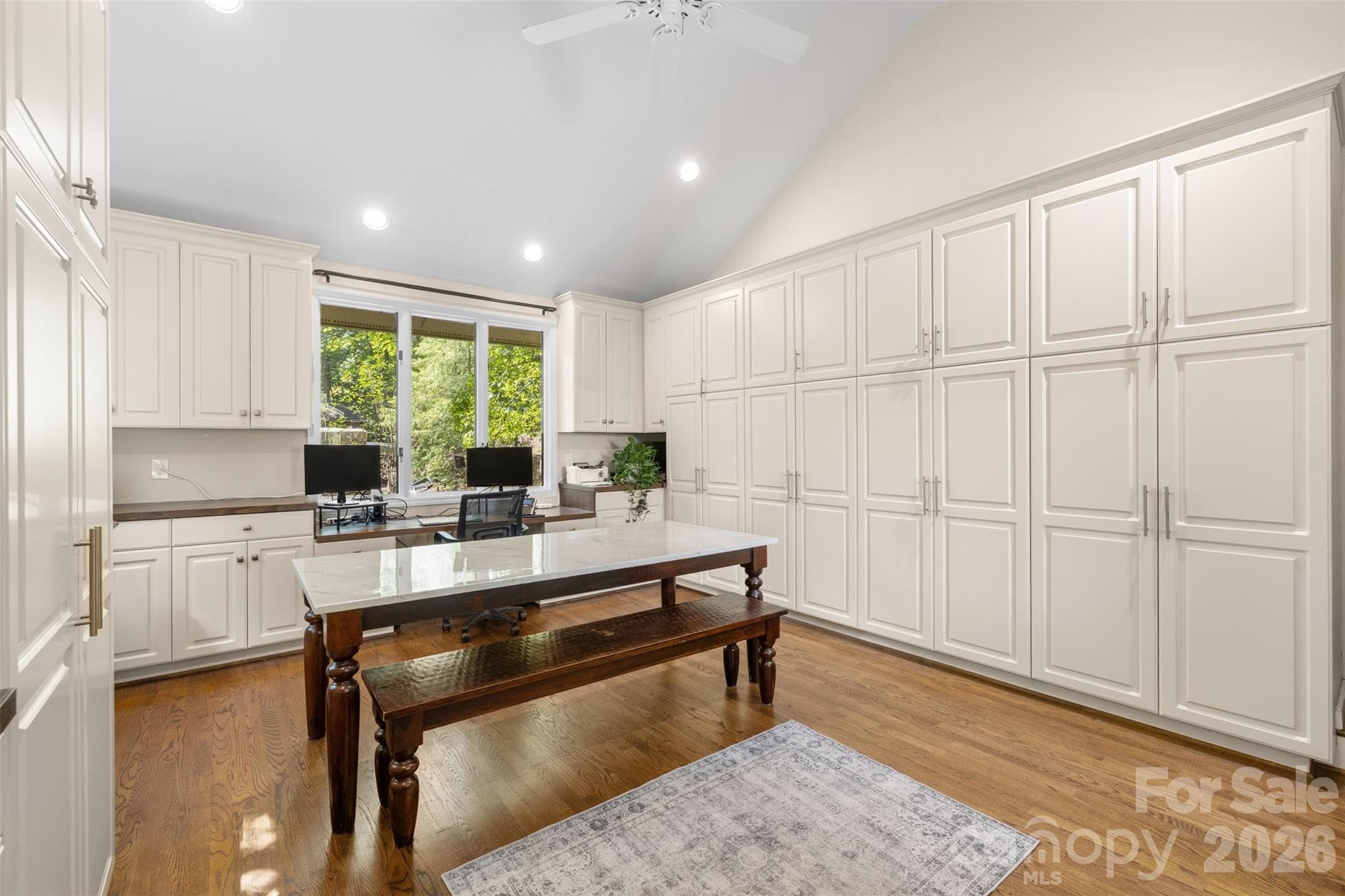 No complaining about a lack of storage! This room off the kitchen offers storage, workspace, homework, home gym, etc. - 27 Timberidge Drive, Lake Wylie