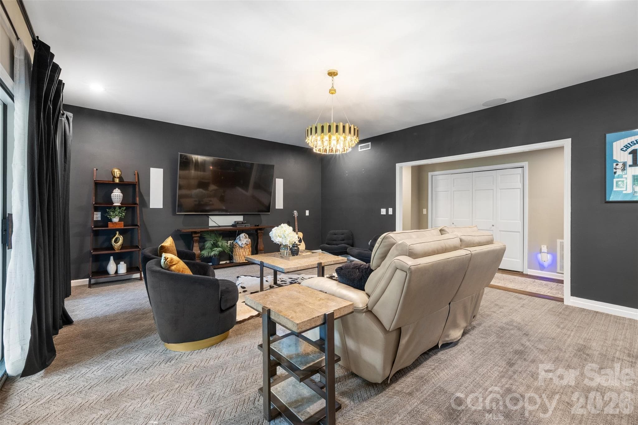 Second living room in lower level offers plush carpeting, black out curtains, wired for surround sound, etc. - 27 Timberidge Drive, Lake Wylie