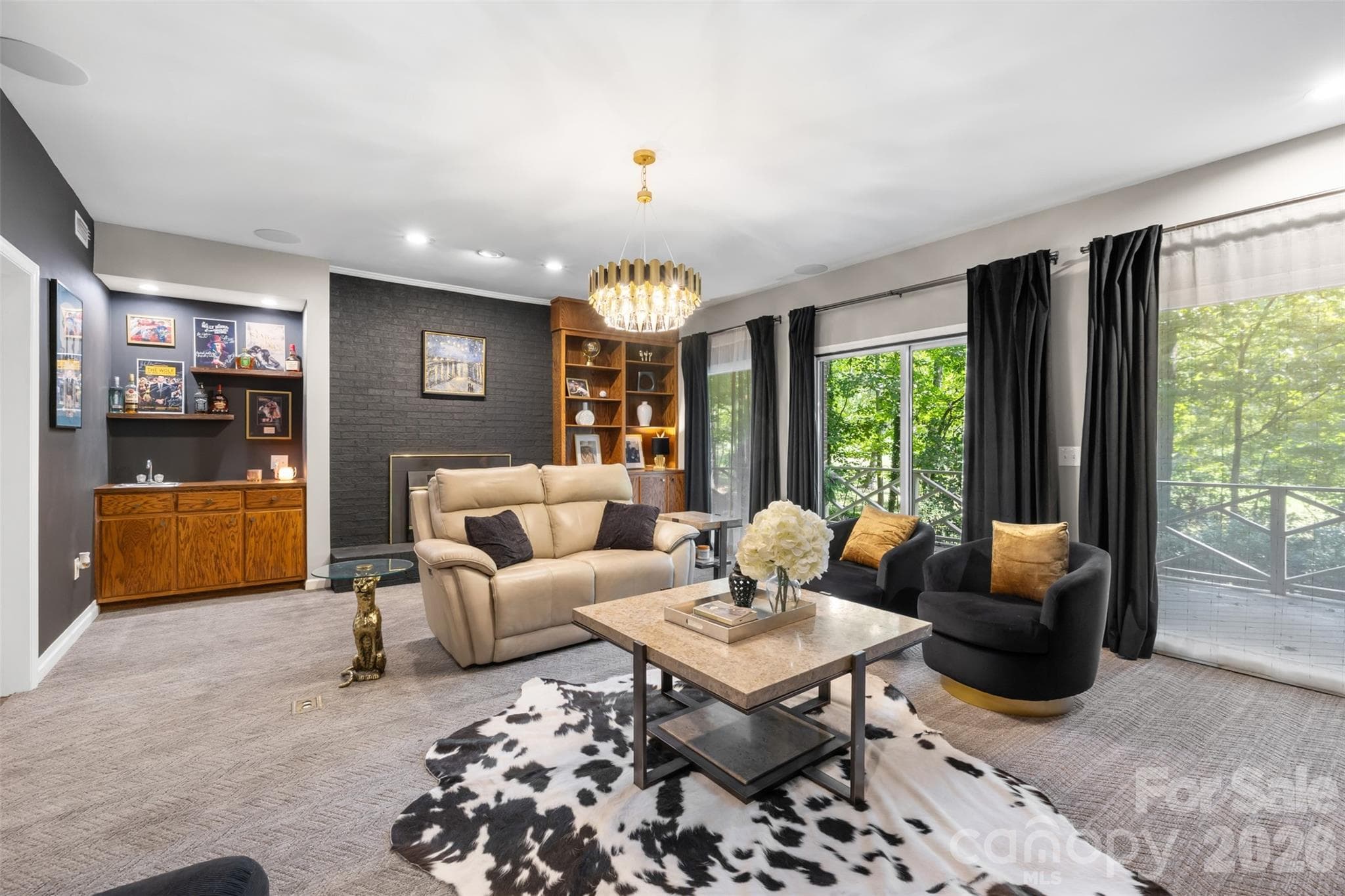 Wet bar, electric fireplace for ambiance and sliders out to lower level deck - 27 Timberidge Drive, Lake Wylie