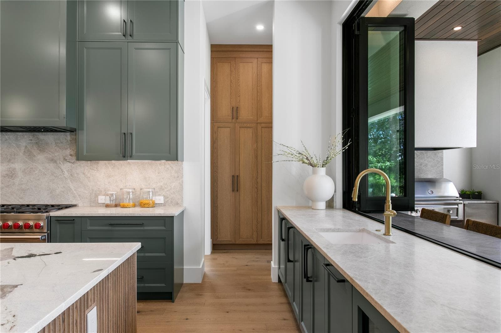 Entry to Pool bath and Built In Storage - 403 S BARBARA LN, TAMPA