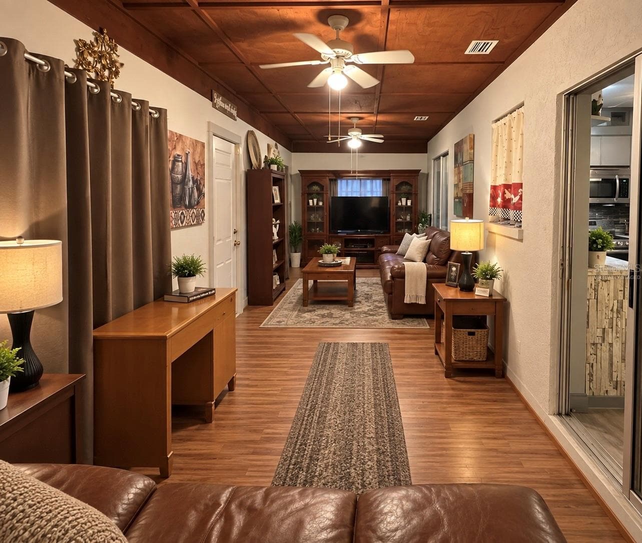 Family Room Virtually Staged - 7707 120TH AVE E, PARRISH