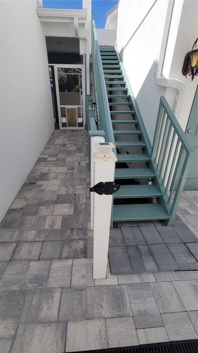 Staircase to in-law suite and door to pool - 4024 11TH STREET CT W, PALMETTO