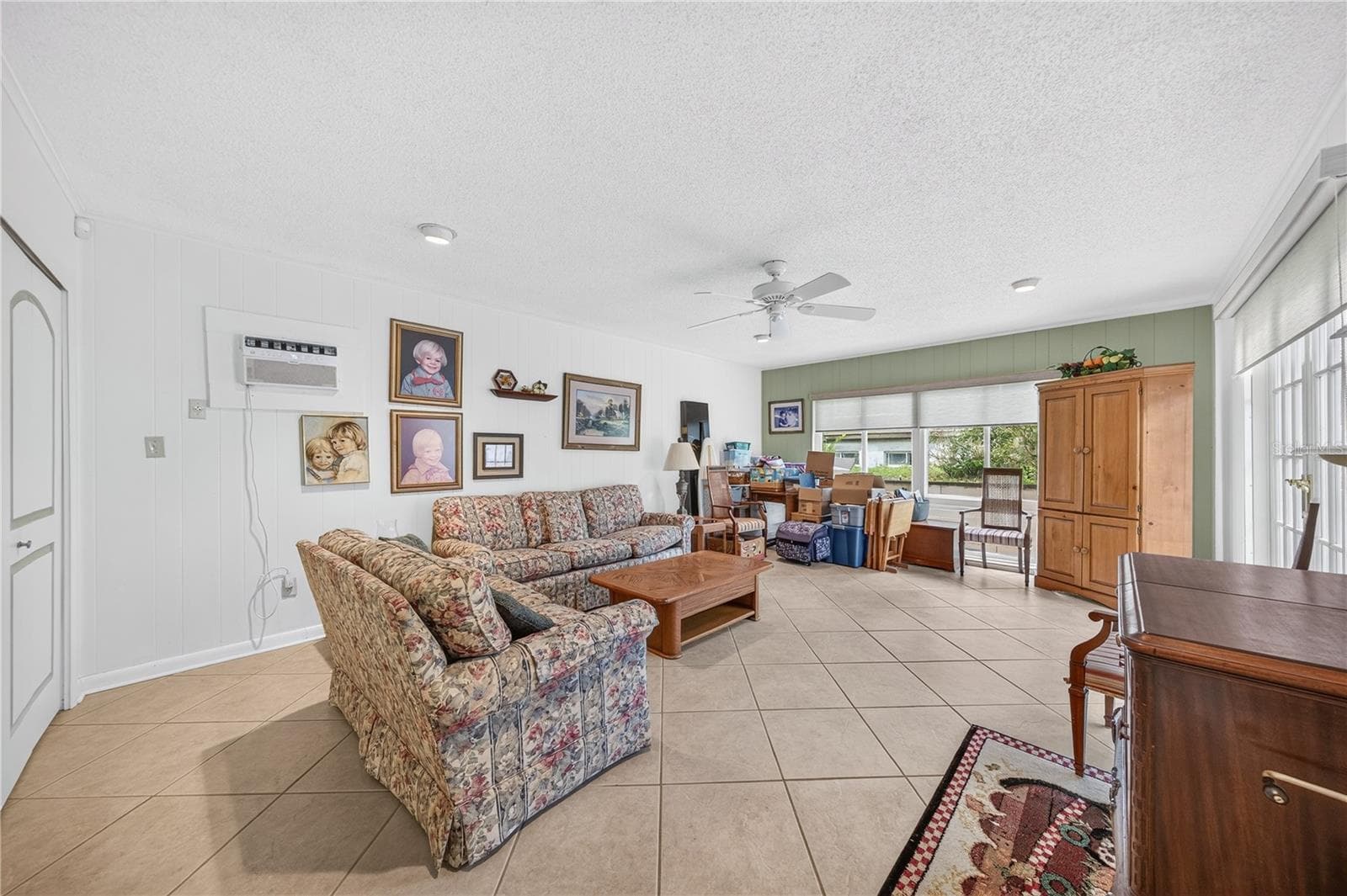 Family room with a pool view. - 1205 DORCHESTER ST, ORLANDO