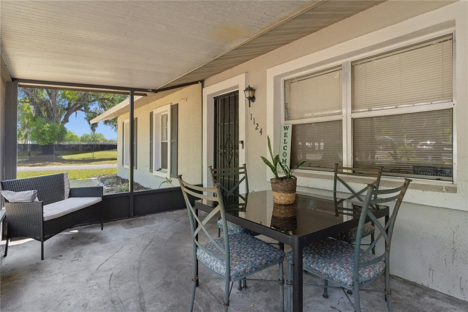 screened front porch - 1124 N GRANT AVE, MOUNT DORA