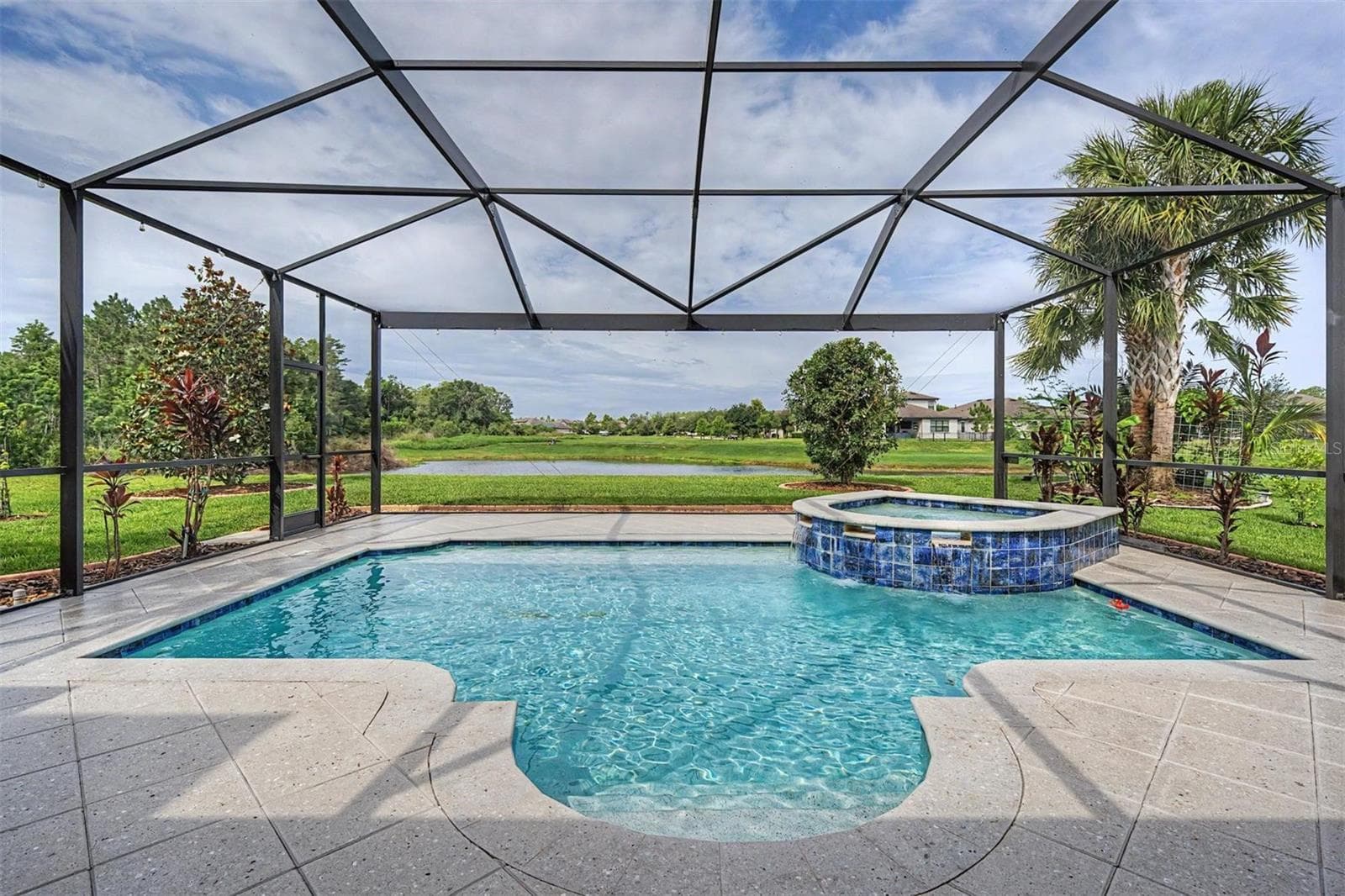 The pool and spa on a sunny day - 4303 BARBOUR TRL, ODESSA