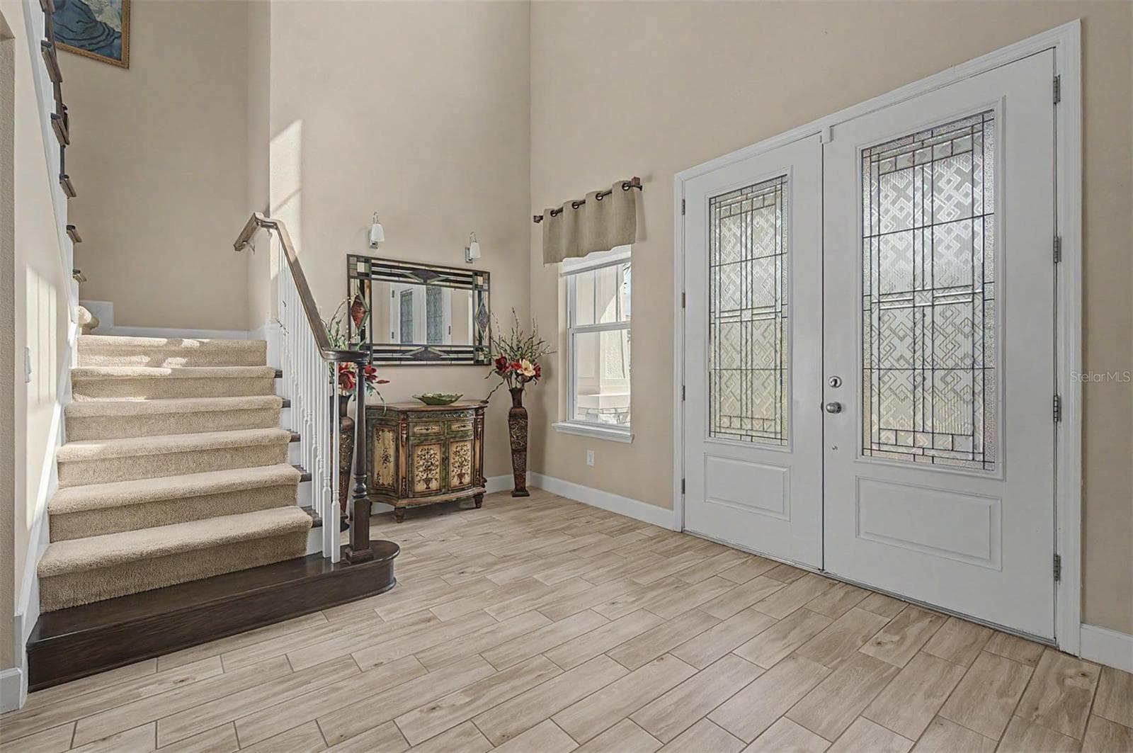 Custom doors with a welcoming entry foyer - 4303 BARBOUR TRL, ODESSA