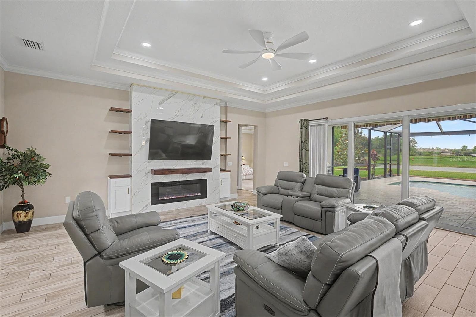 Great room with a double tray ceiling - 4303 BARBOUR TRL, ODESSA