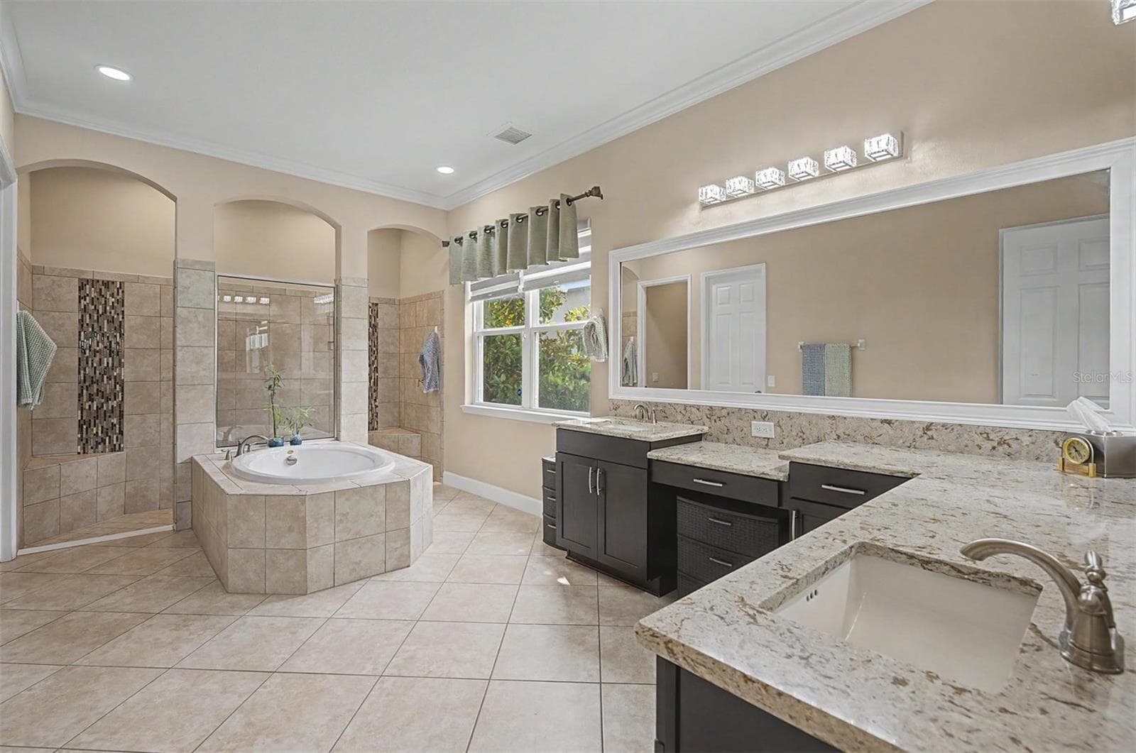 Spa-like bathroom with plenty of storage options - 4303 BARBOUR TRL, ODESSA