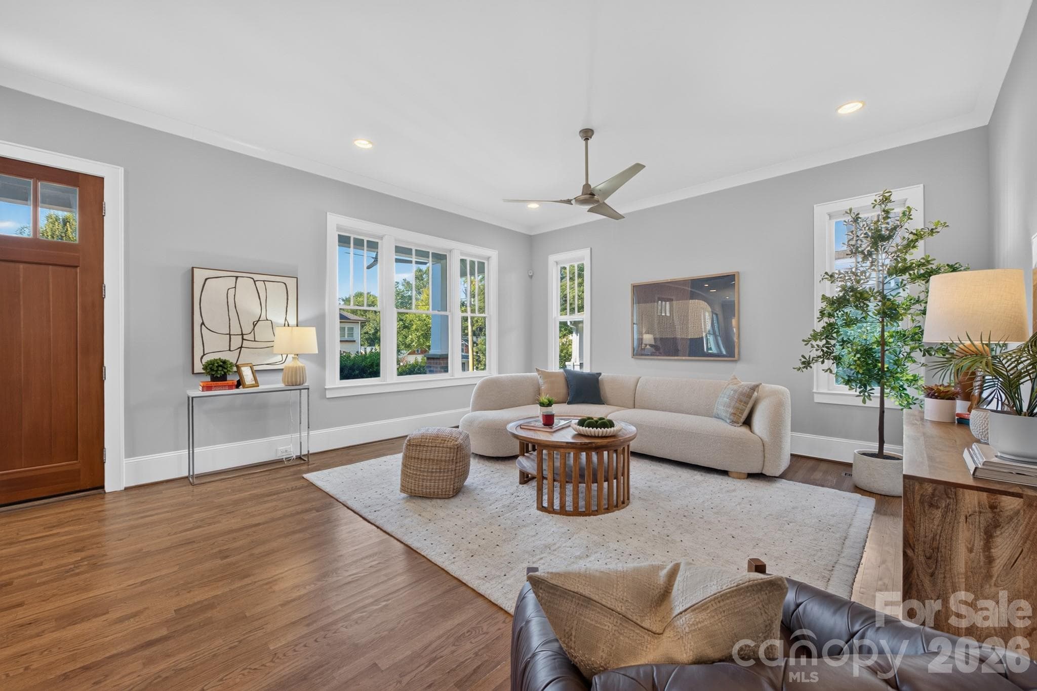 An enormous living room with excellent windows allows you to host plenty of family and friends. - 416 W Park Avenue, Charlotte