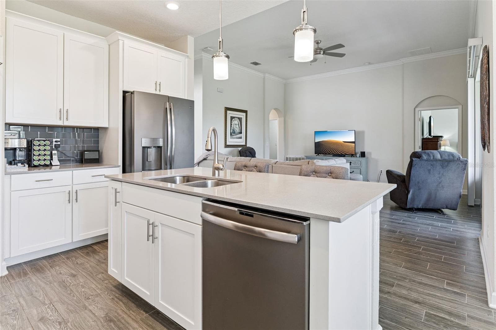 Center Island with Quartz Countertops and Pendant Lighting - 4075 BEDFORD AVE, WINTER HAVEN