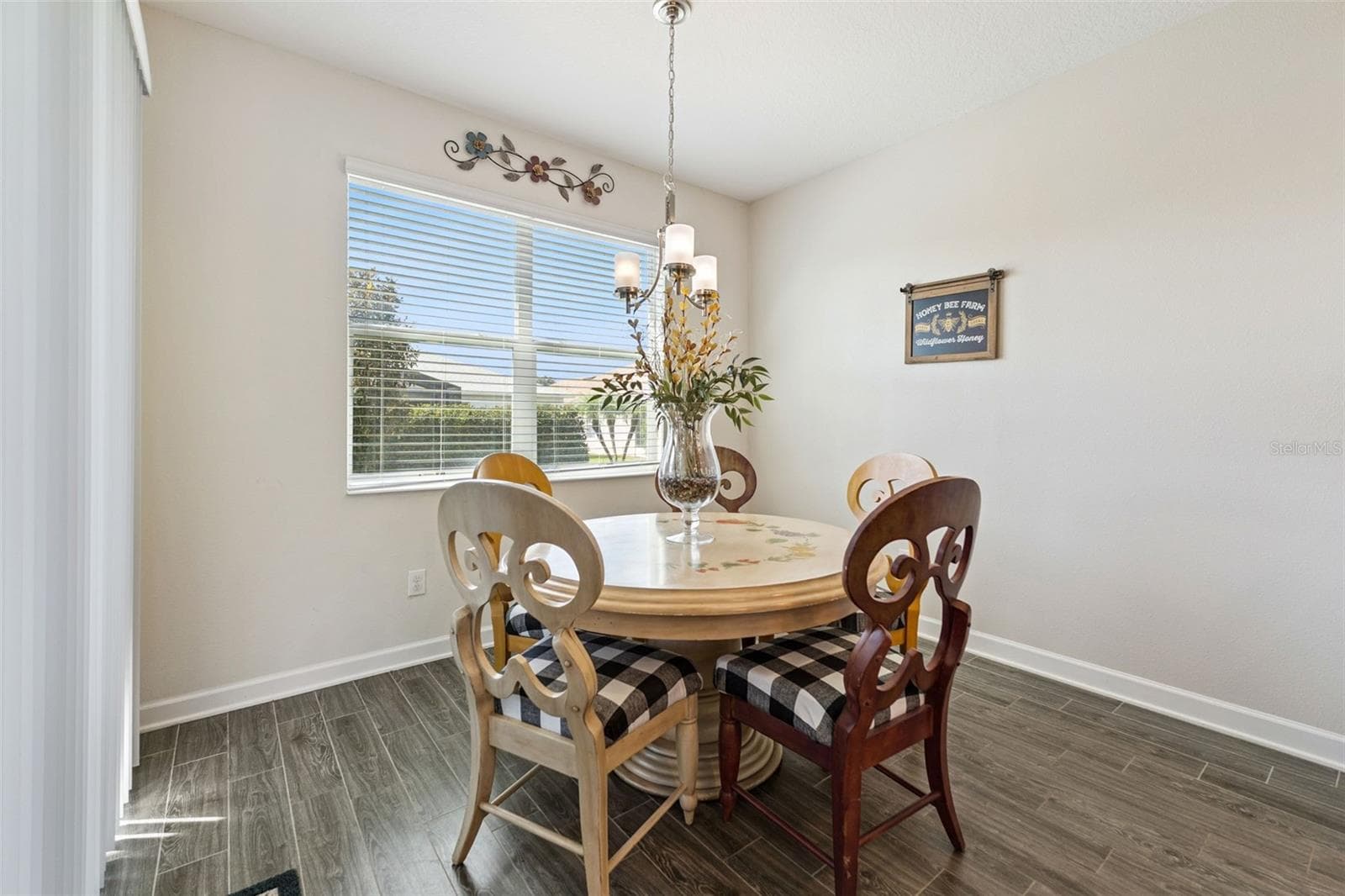 The charming breakfast nook offers the perfect spot for casual dining - 4075 BEDFORD AVE, WINTER HAVEN