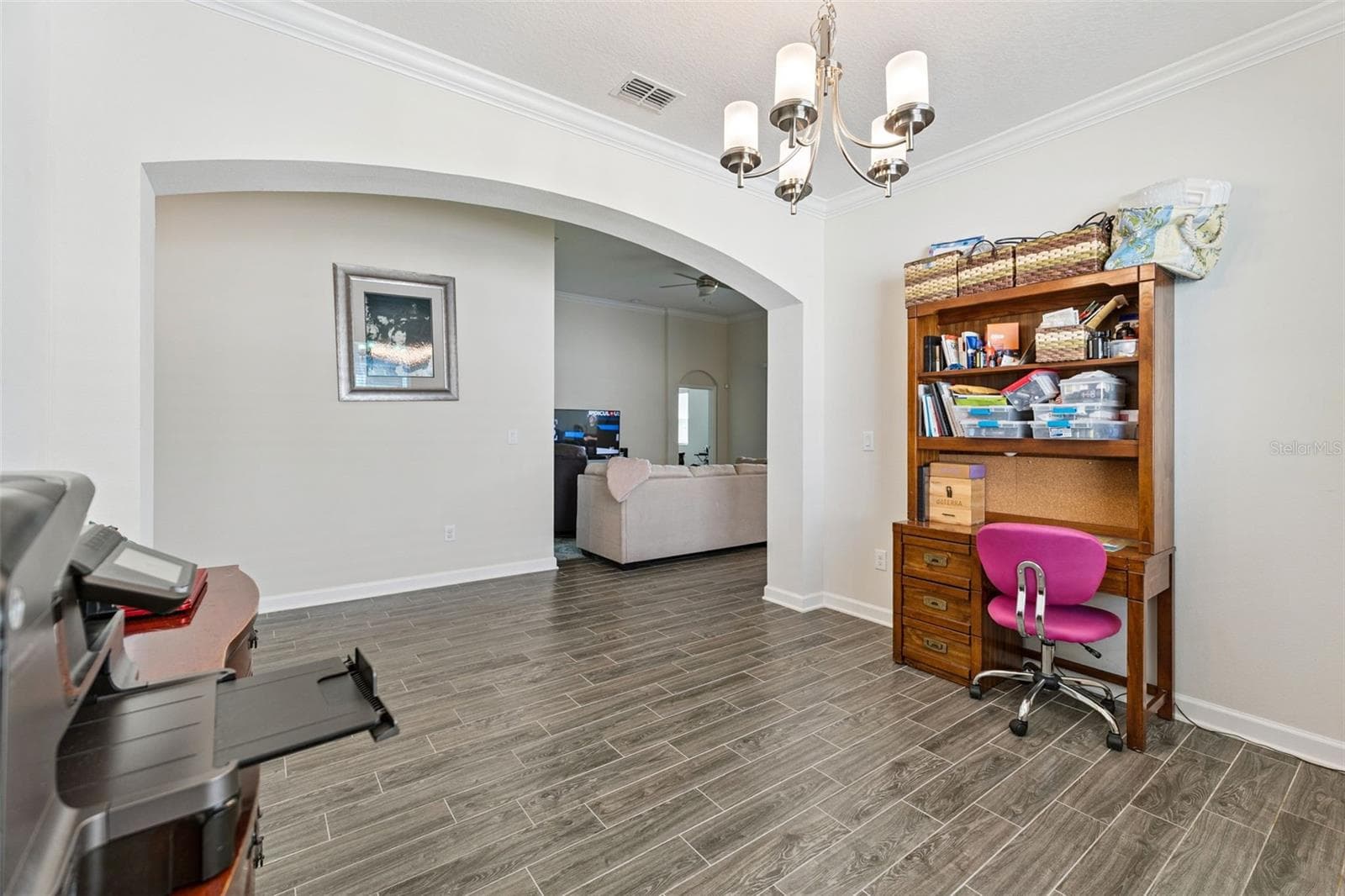 Designed for entertaining, the open-concept floor plan allows the formal Dining Room to flow naturally into the Great Room - 4075 BEDFORD AVE, WINTER HAVEN