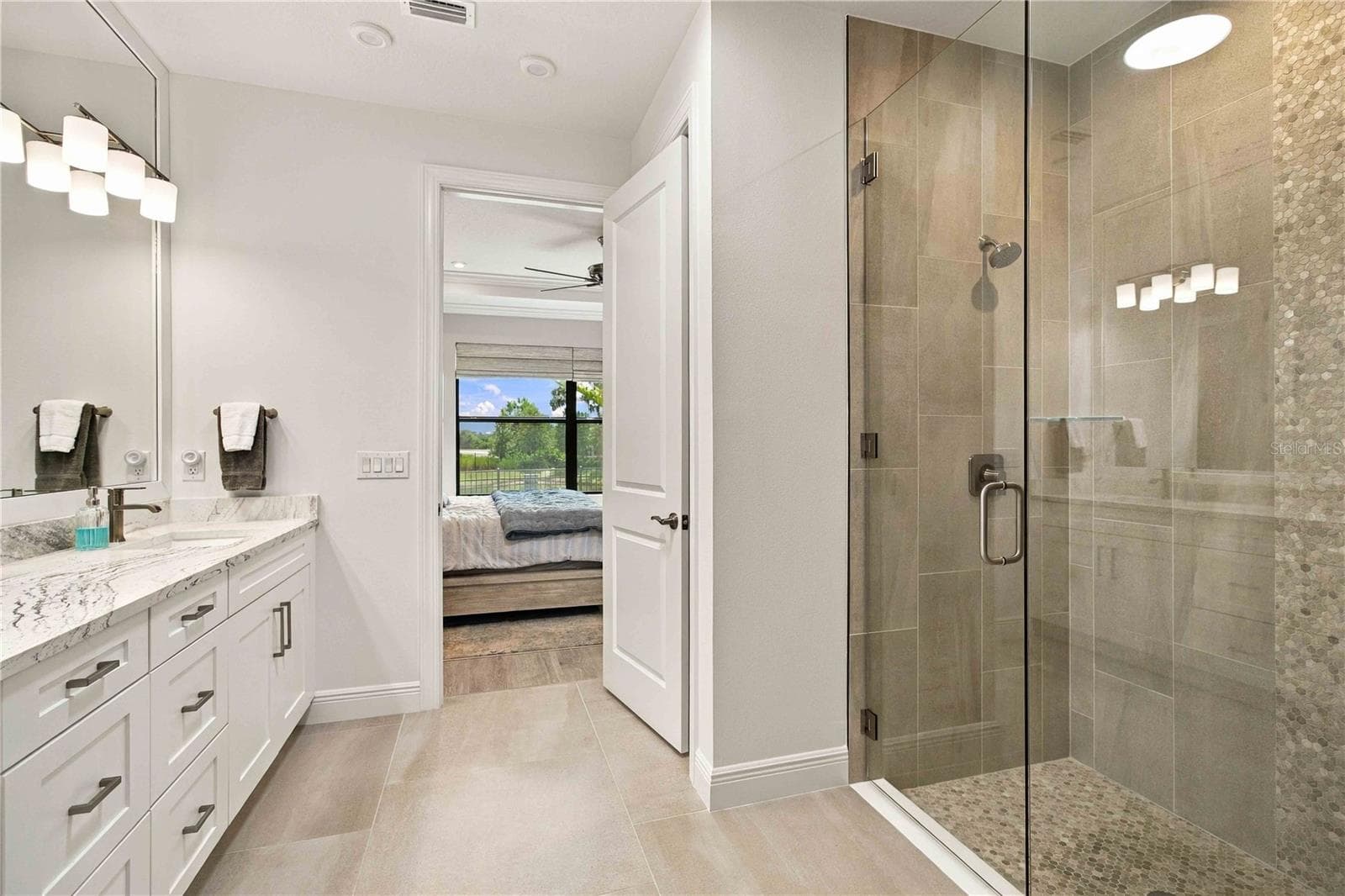 Sophisticated Finishes throughout & Tile to the ceiling details - 14449 HAMMOCK OAK ST, PARRISH