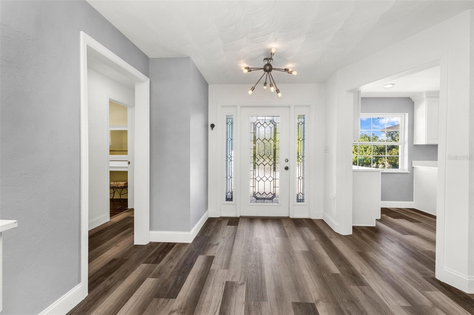 Front door entry to main house. Guest rooms to the left and kitchen to the right - 3407 ISLAND VIEW DR, PUNTA GORDA