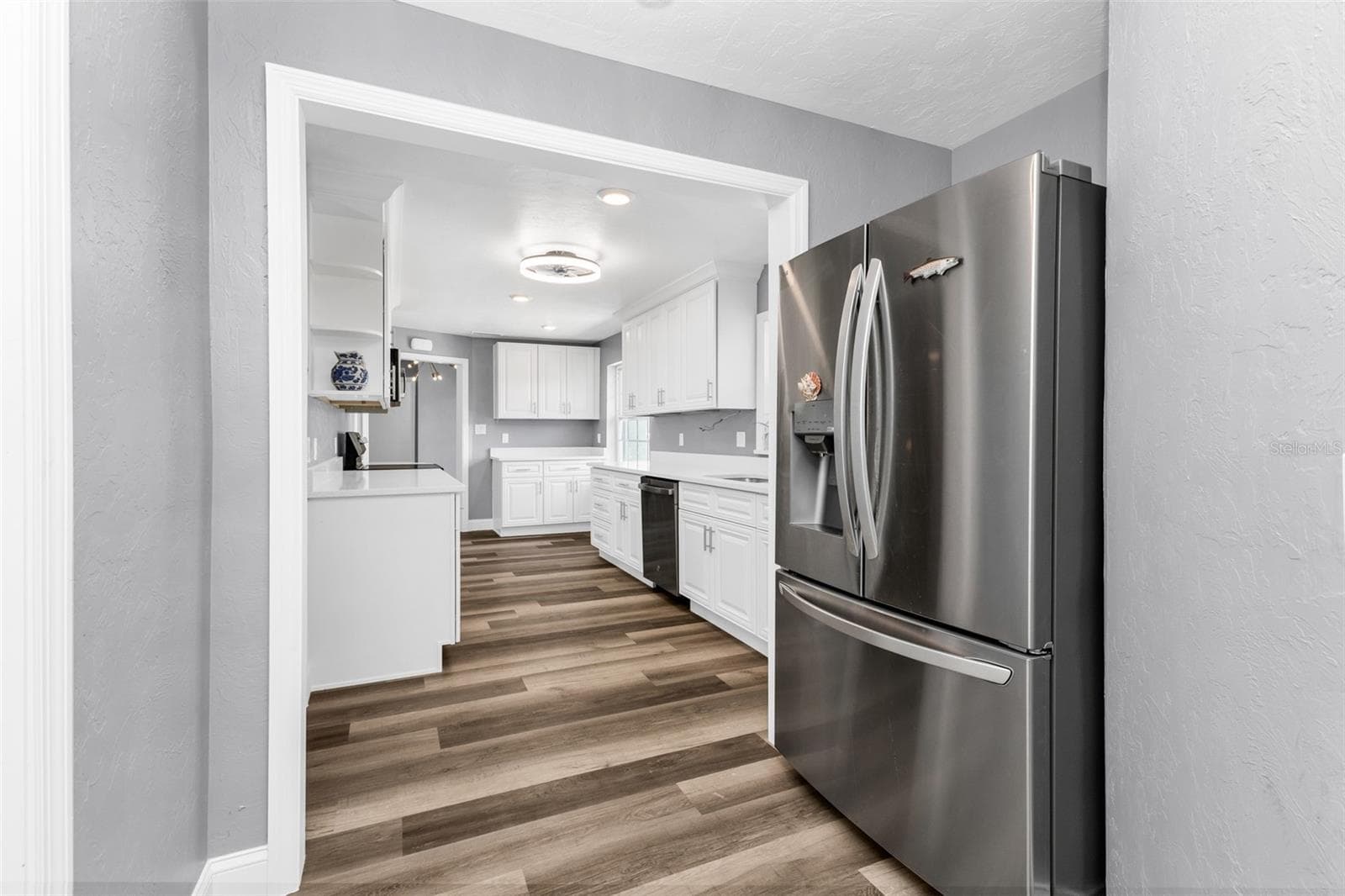 View of Kitchen from laundry room - 3407 ISLAND VIEW DR, PUNTA GORDA