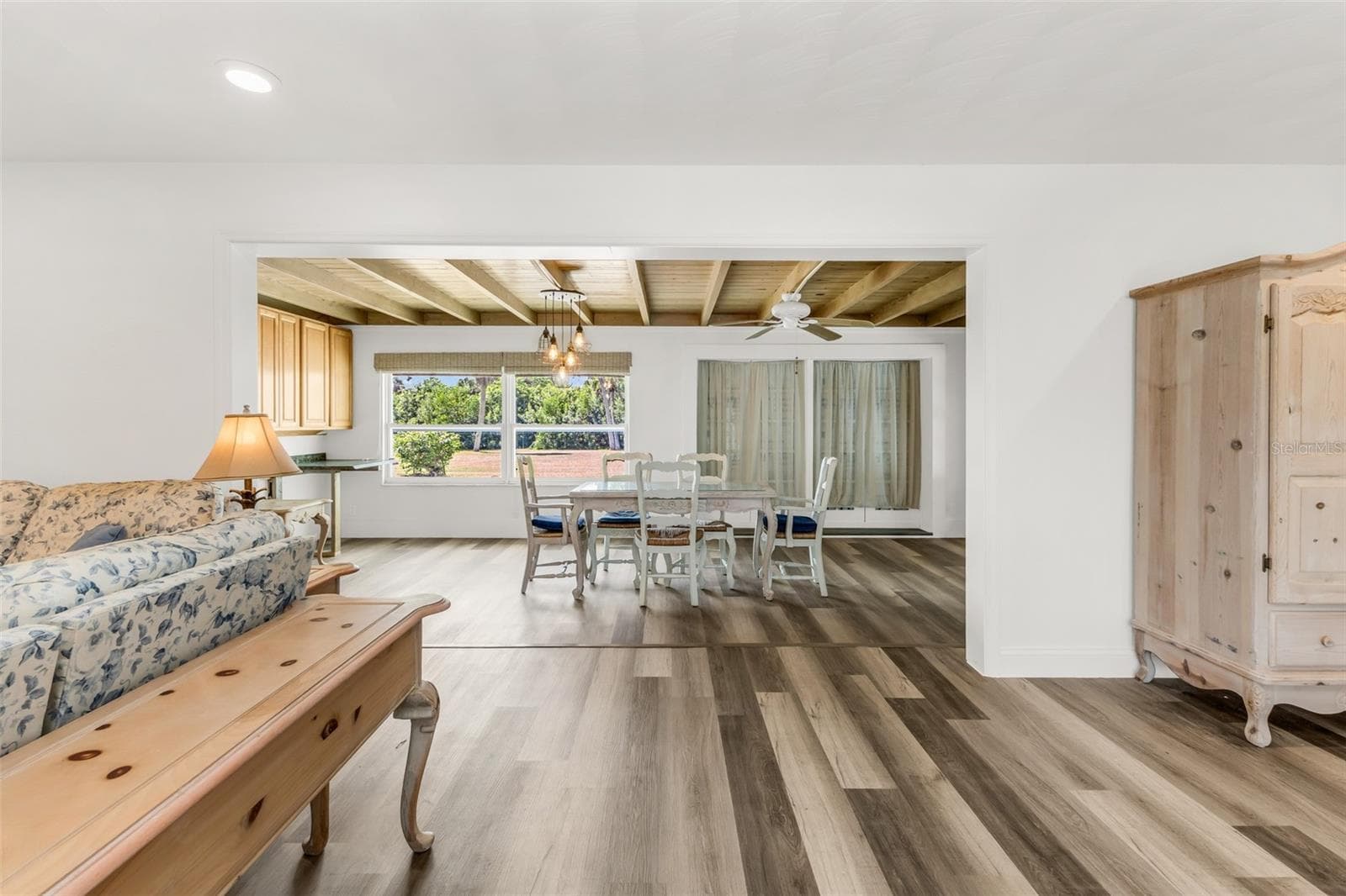 Living room with dining room view - 3407 ISLAND VIEW DR, PUNTA GORDA