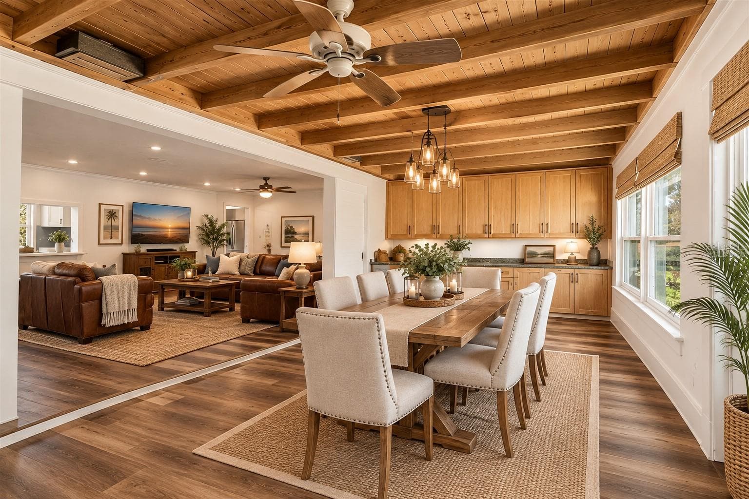 Virtually staged dining room photo with view of living room - 3407 ISLAND VIEW DR, PUNTA GORDA