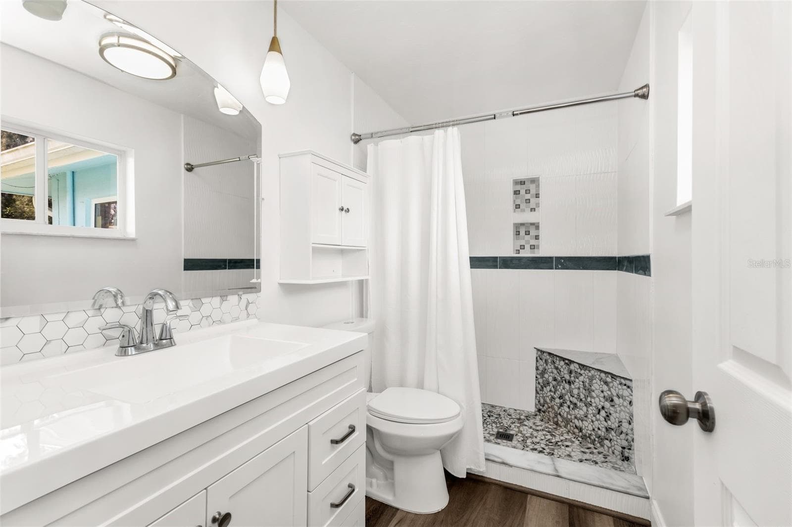 Primary Bathroom with updated tile shower - 3407 ISLAND VIEW DR, PUNTA GORDA