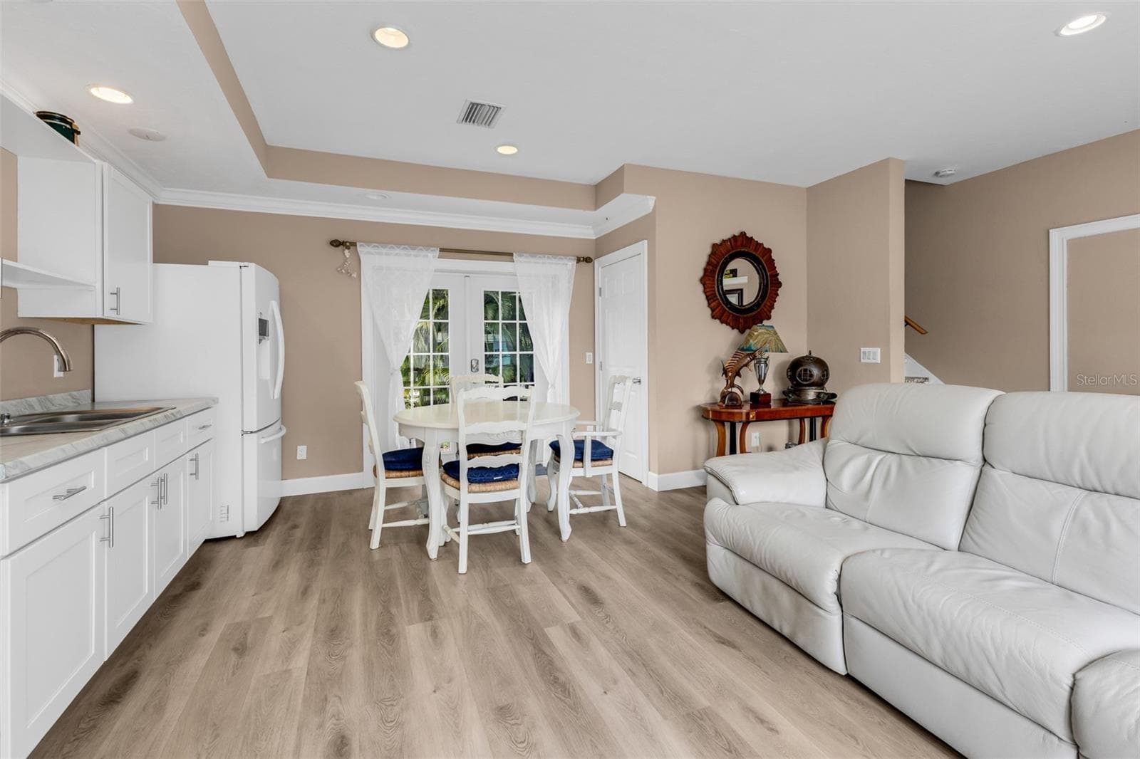 Living & Kitchen view from French doors - 3407 ISLAND VIEW DR, PUNTA GORDA