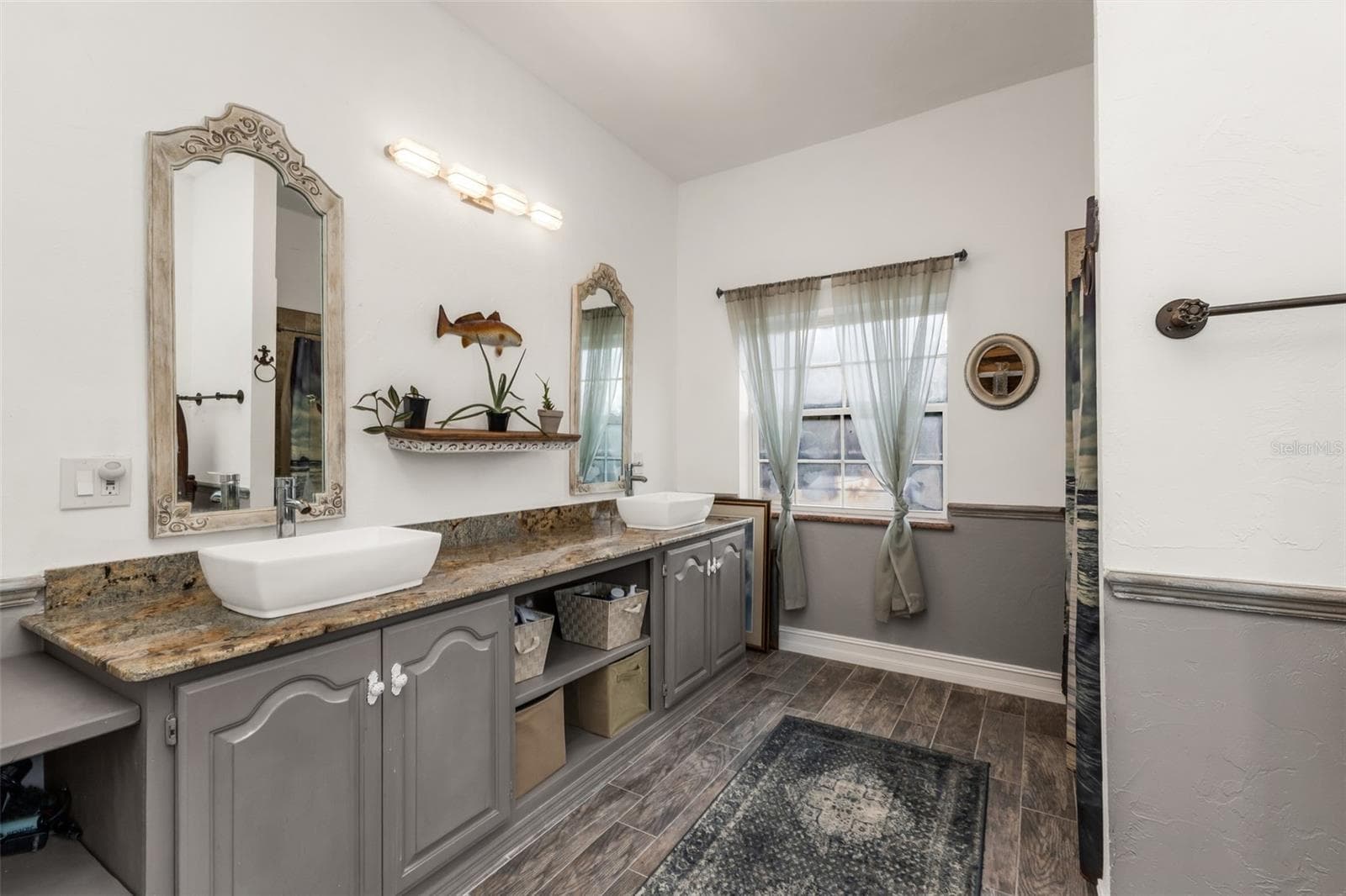 Upstairs bathroom with dual sinks and shower - 3407 ISLAND VIEW DR, PUNTA GORDA