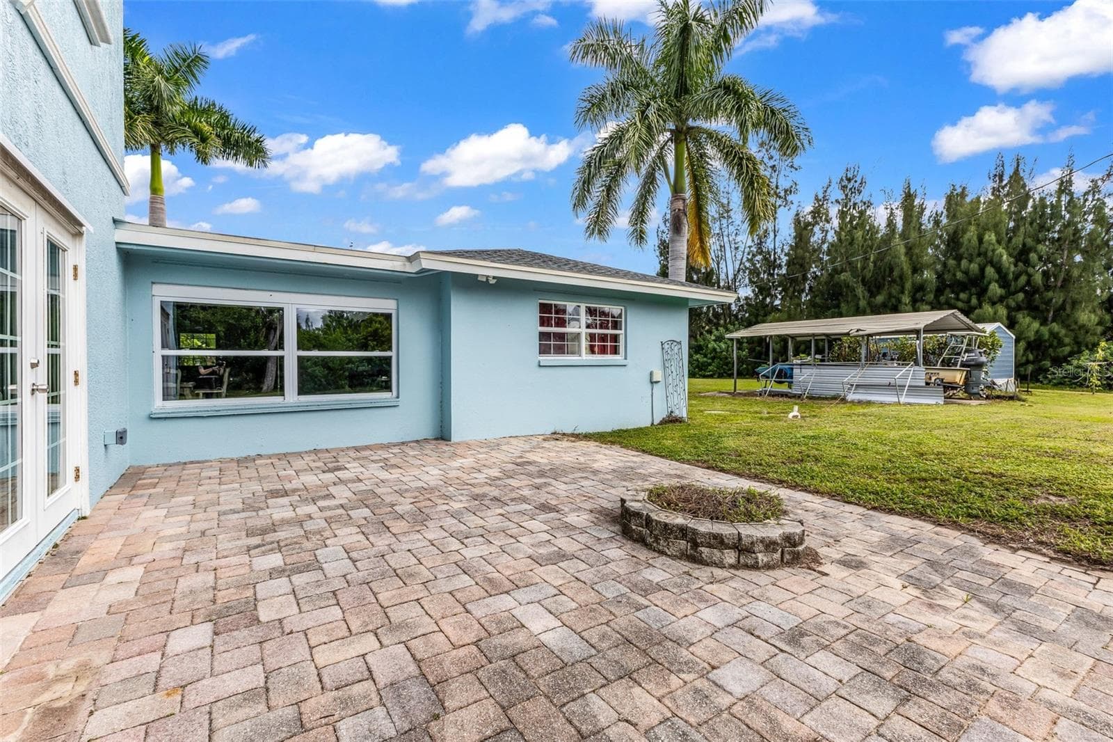 Back paver patio out of french doors - 3407 ISLAND VIEW DR, PUNTA GORDA