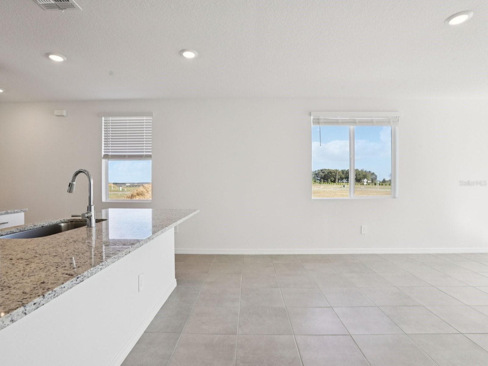 Photo is not of the actual home, but is an inspirational photo of builder’s model home and may depict options, furnishings, and/or decorator features that are not included - 3910 TEAK LN, BARTOW