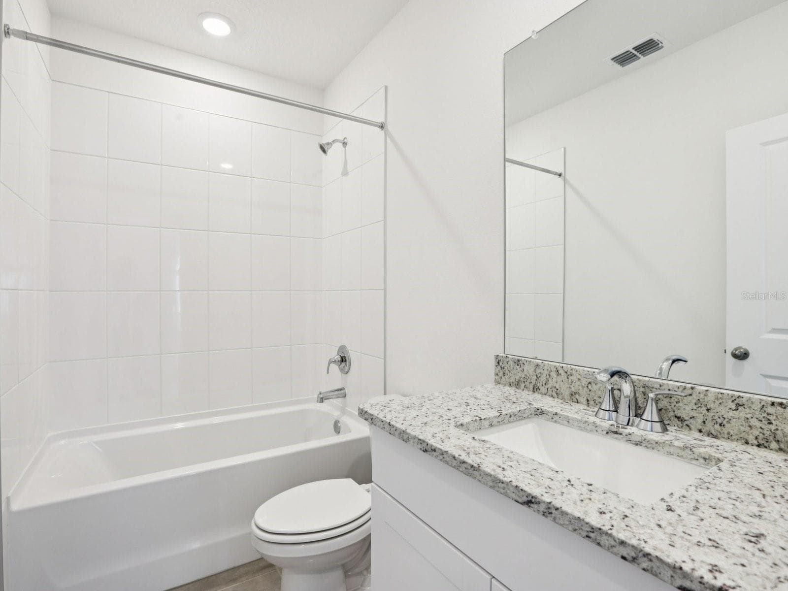 Photo is not of the actual home, but is an inspirational photo of builder’s model home and may depict options, furnishings, and/or decorator features that are not included - 3910 TEAK LN, BARTOW