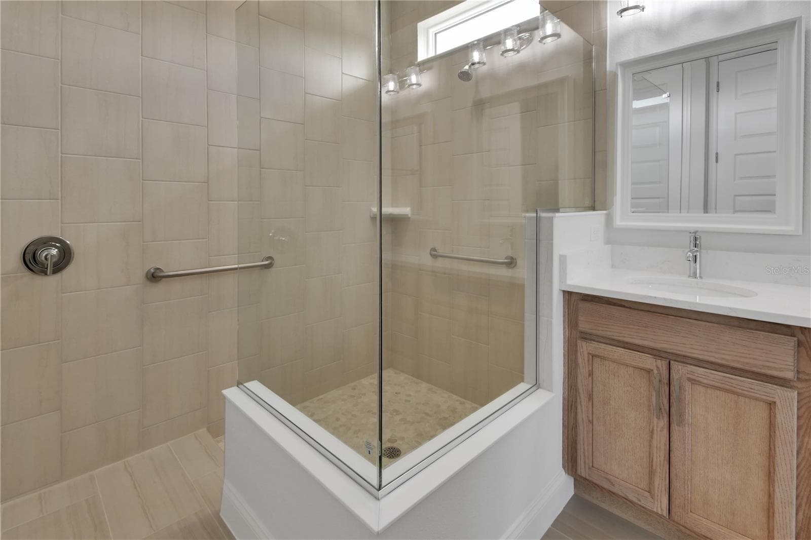 Grab bar in spacious shower - 1022 MEGANO BLVD, DELAND